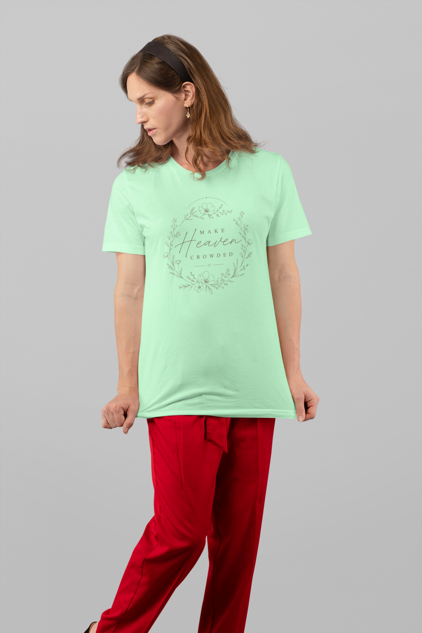 studio-mockup-of-a-woman-grabbing-her-t-shirt-32941 (1).png