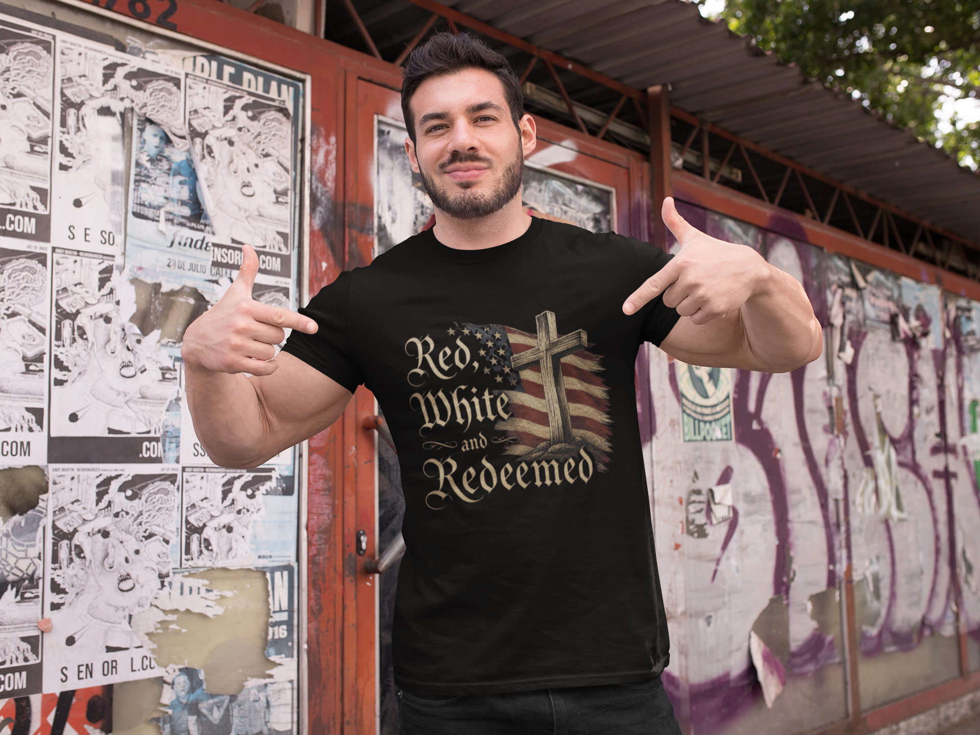 t-shirt-mockup-of-a-fitness-man-posing-against-a-wall-with-posters-28526.png