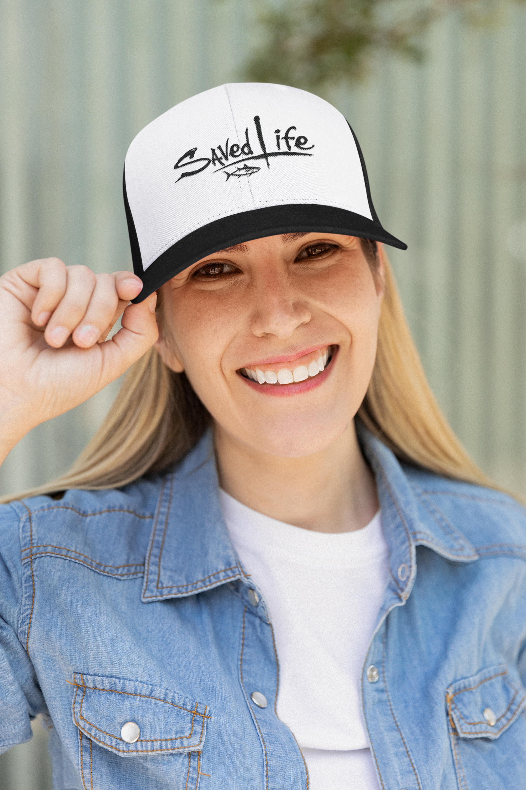 yupoong-trucker-hat-mockup-featuring-joyful-woman-with-a-denim-jacket-m34837 (1).png