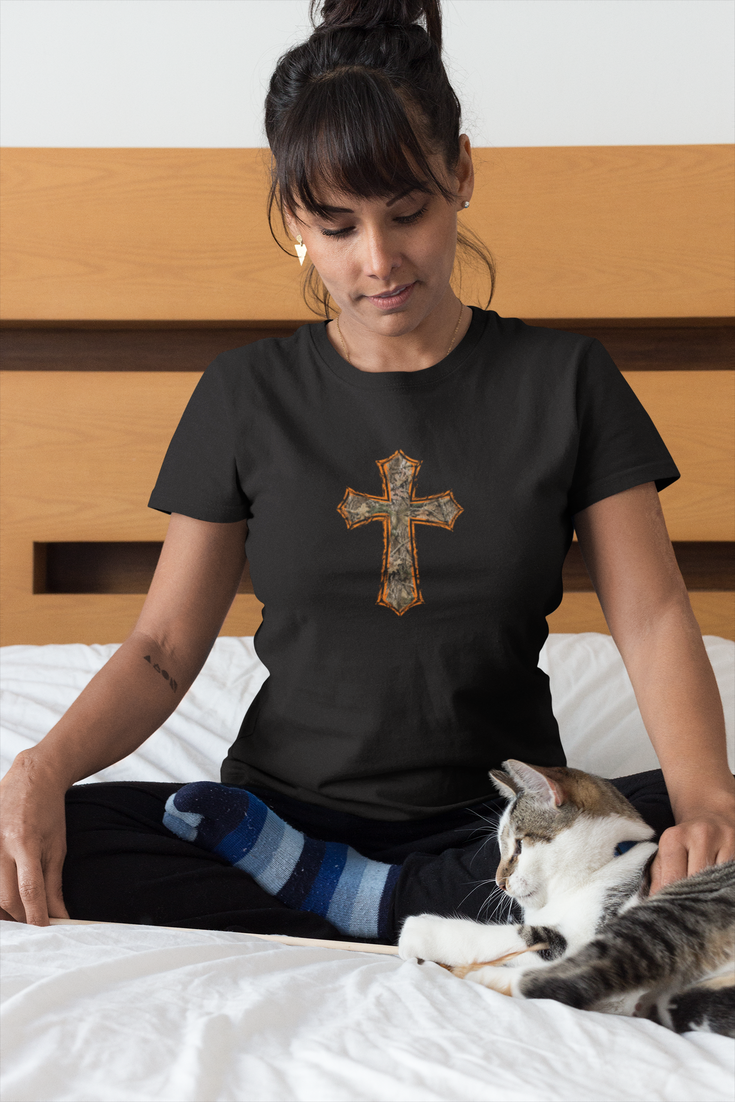 woman-wearing-a-t-shirt-mockup-petting-her-cat-on-bed-a18779 (1).png