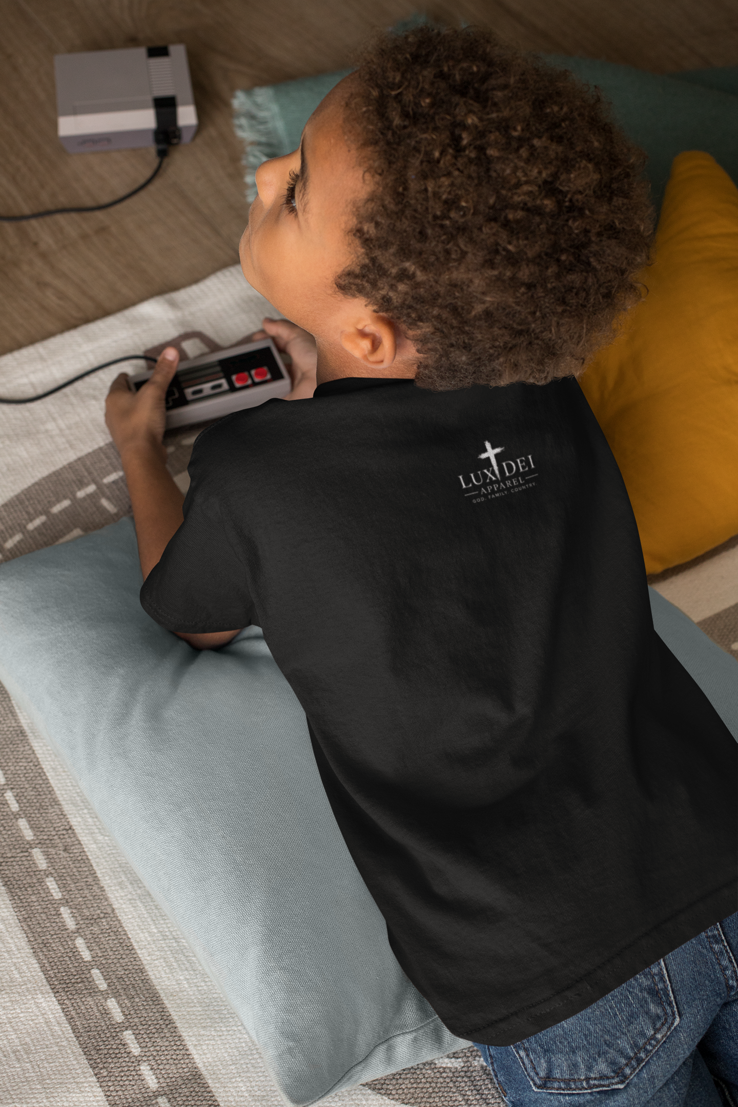 back-view-tee-mockup-of-a-little-boy-playing-video-games-31640.png