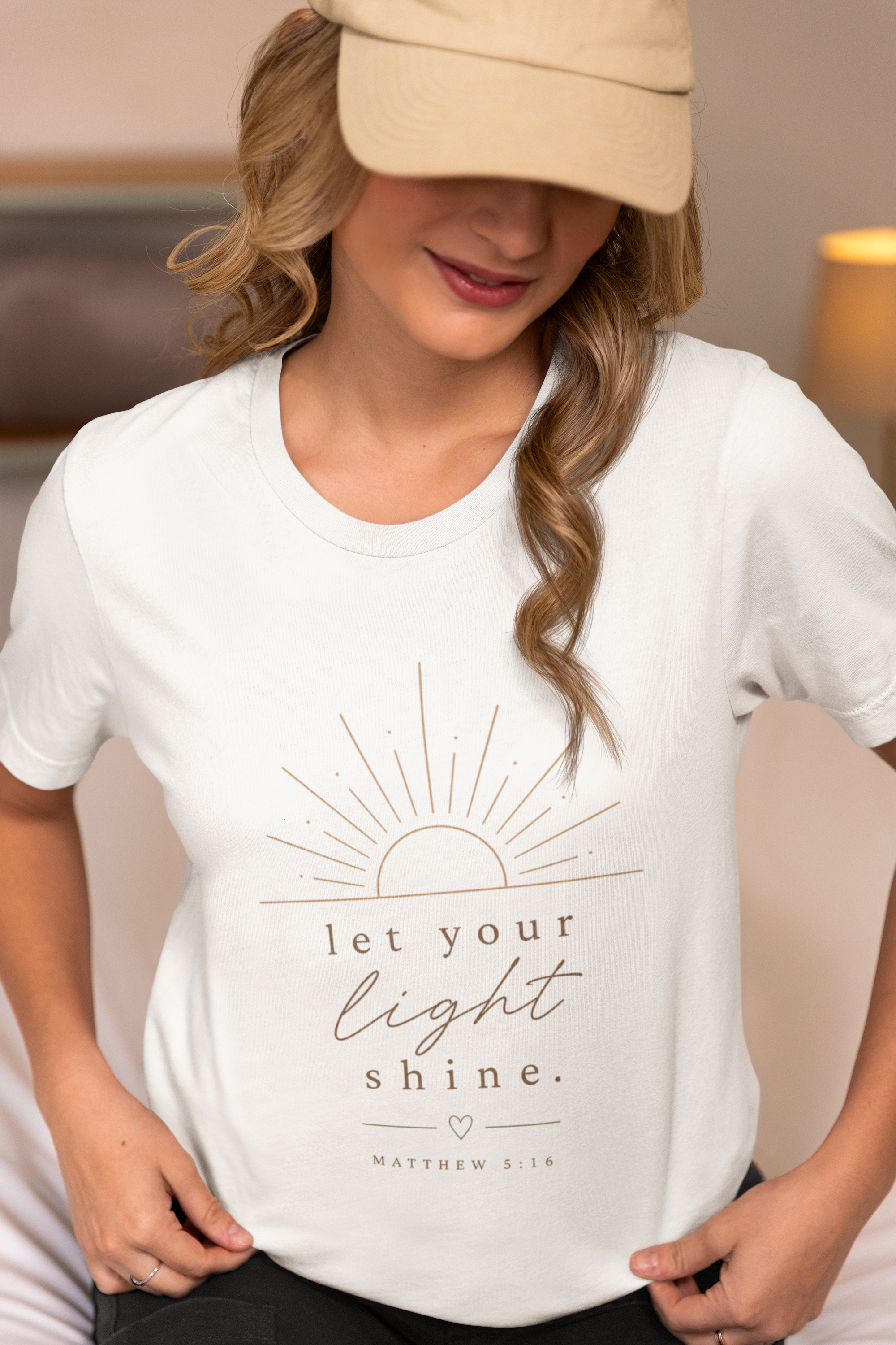 bella-canvas-t-shirt-mockup-of-a-female-influencer-at-home-m37291 (1).png