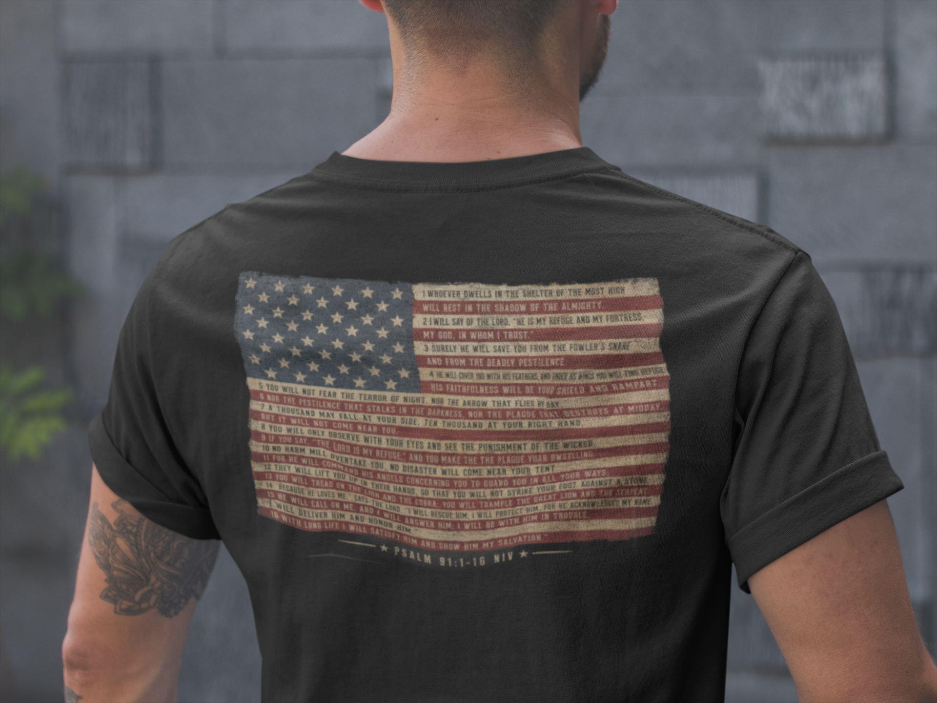 back-of-a-tattooed-man-wearing-a-tshirt-mockup-a20902.png