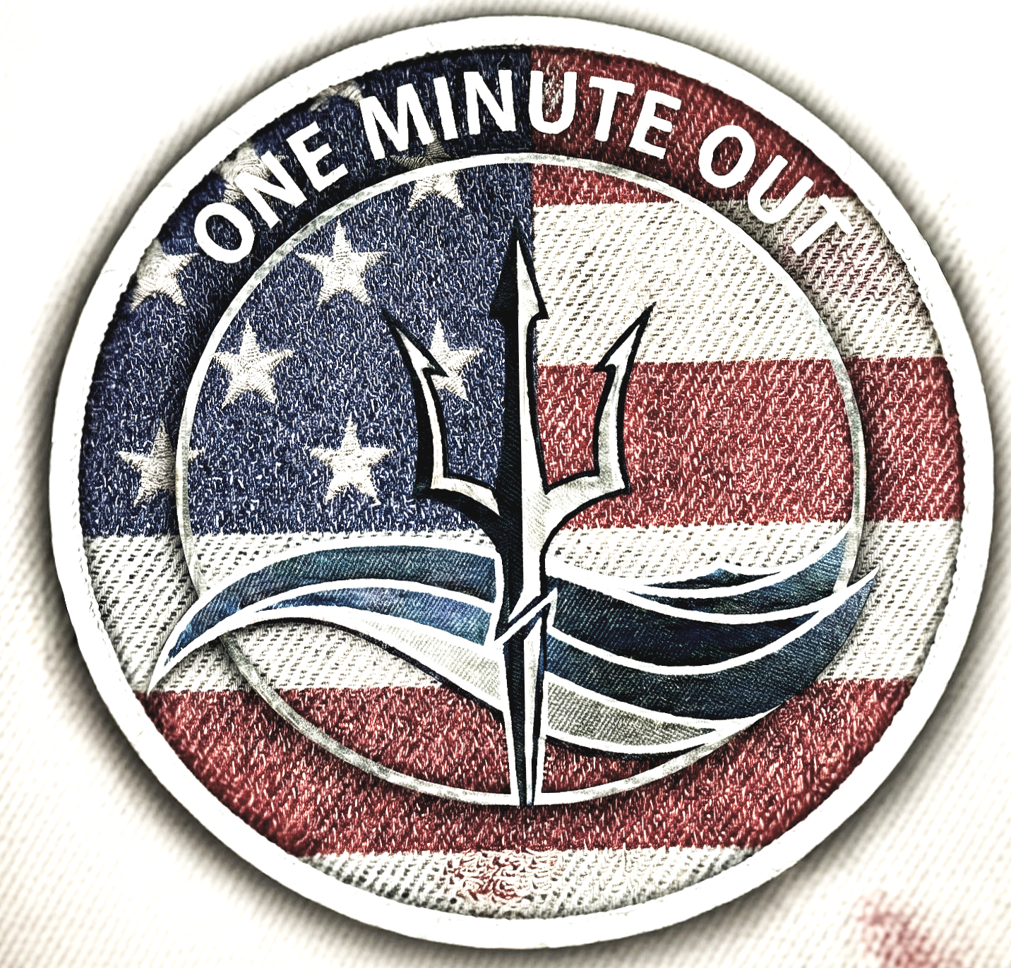 A circular embroidered patch featuring the American flag in the background with the words 'ONE MINUTE OUT' at the top. In the center is a stylized trident or spear graphic.