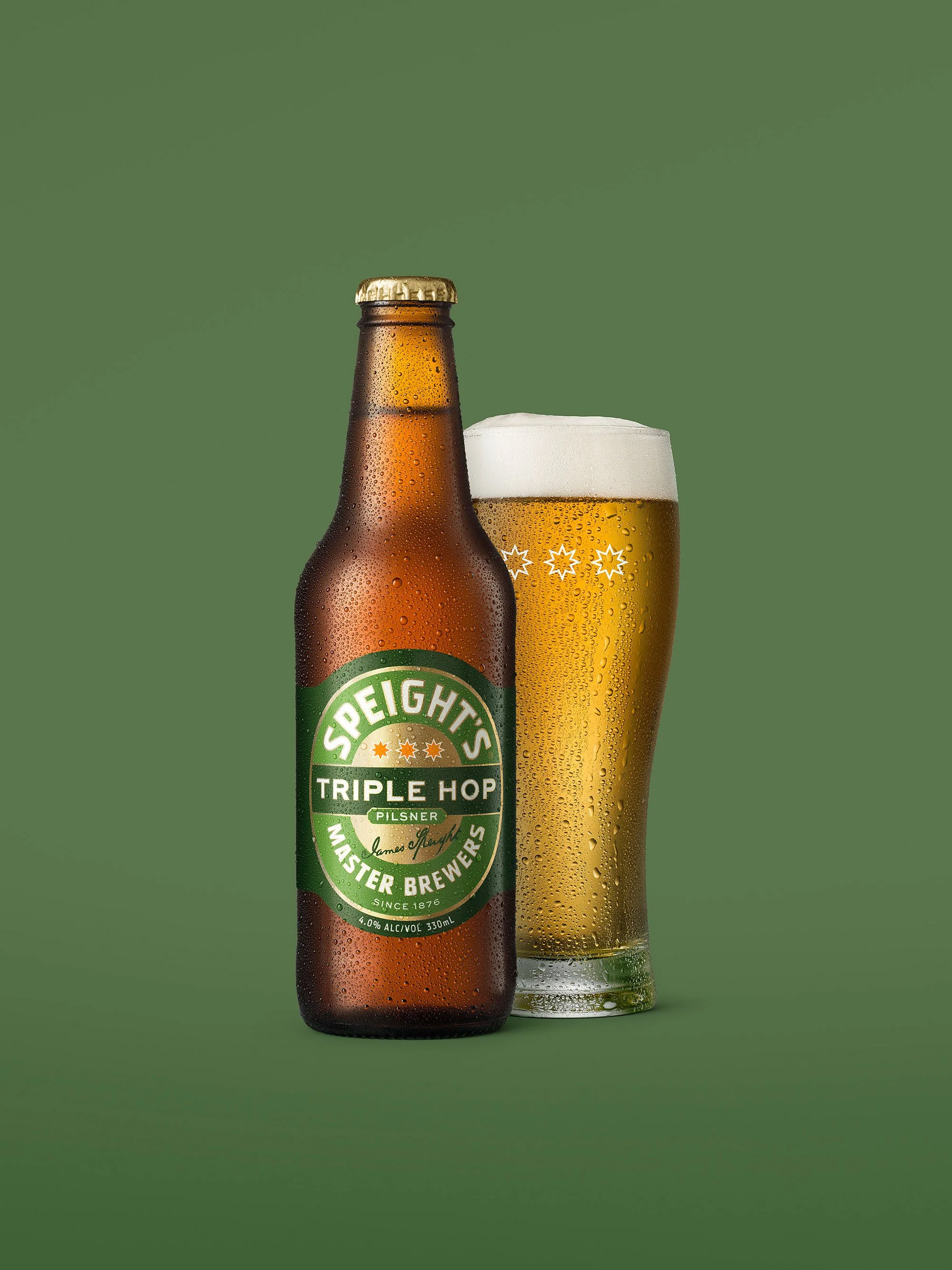Clean product photograph of Speight’s Triple Hop with bottle and glass, styled to show freshness, colour and label clarity.