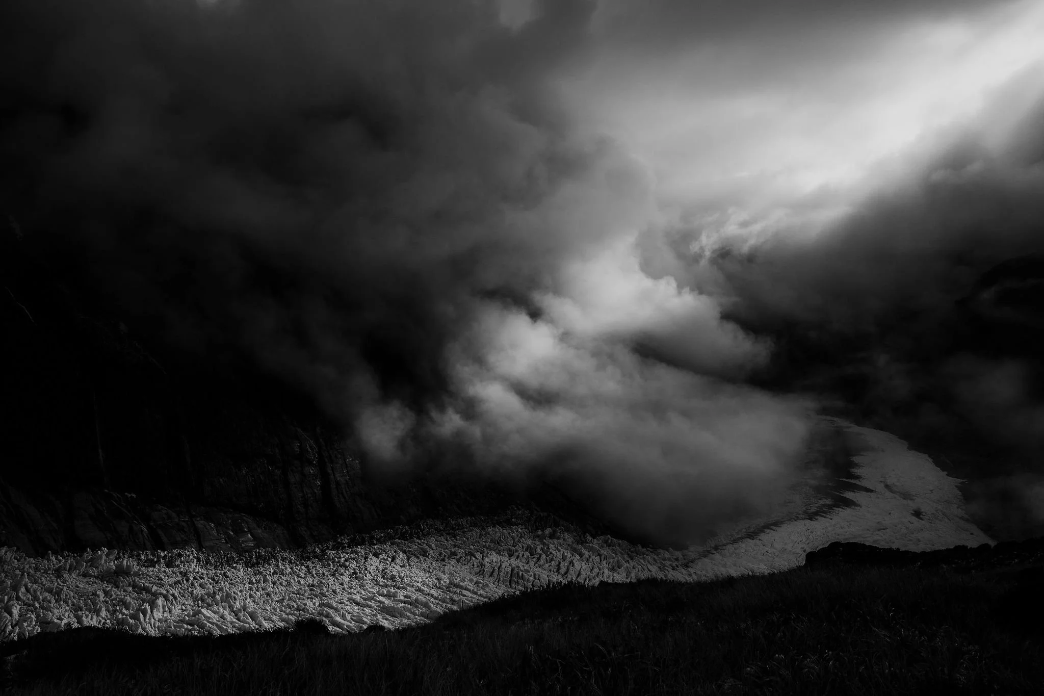 dramatic stormy glacier fine art image in black and white