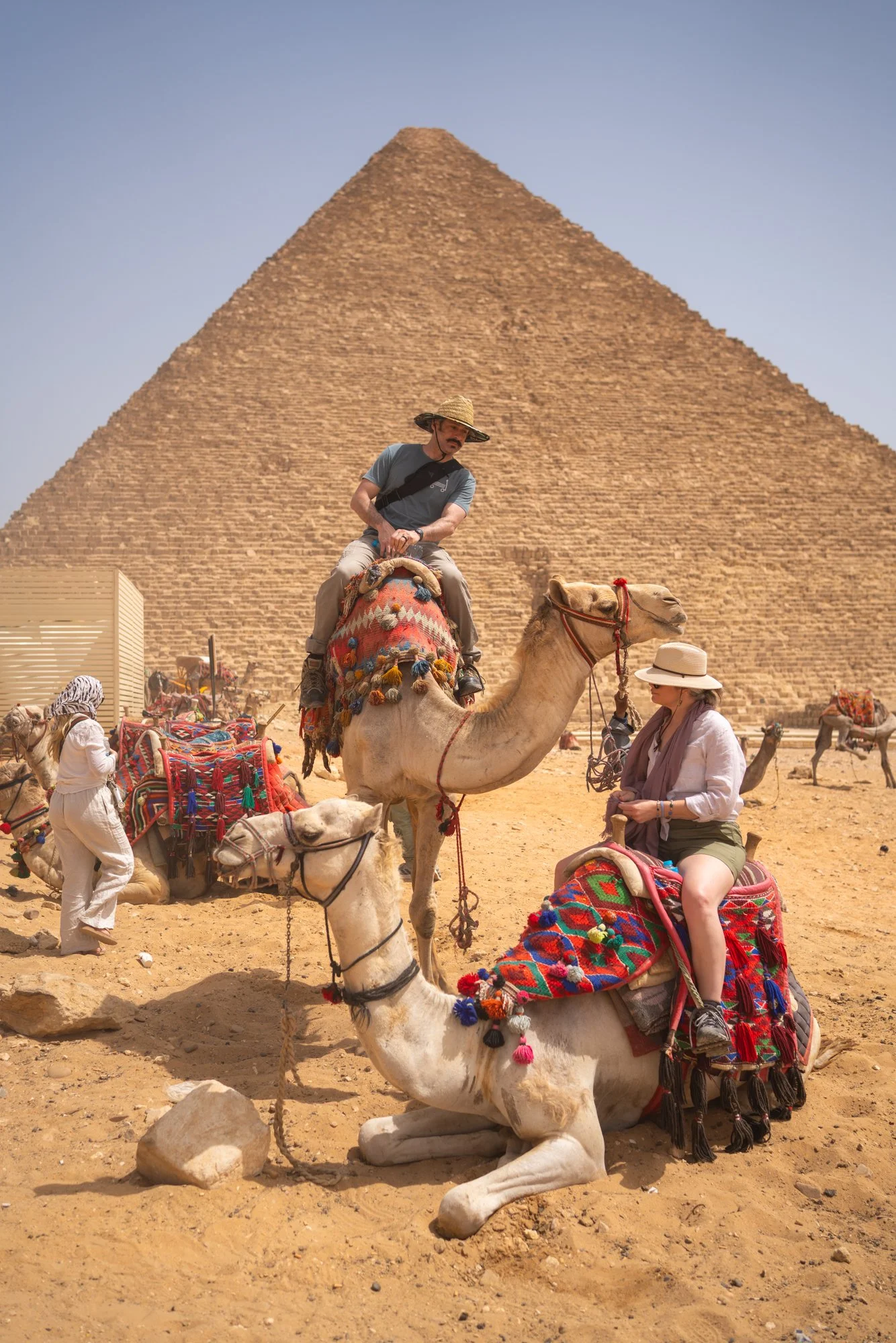 ride camels around the pyramids in egypt with starlight voyages and abdul dremali