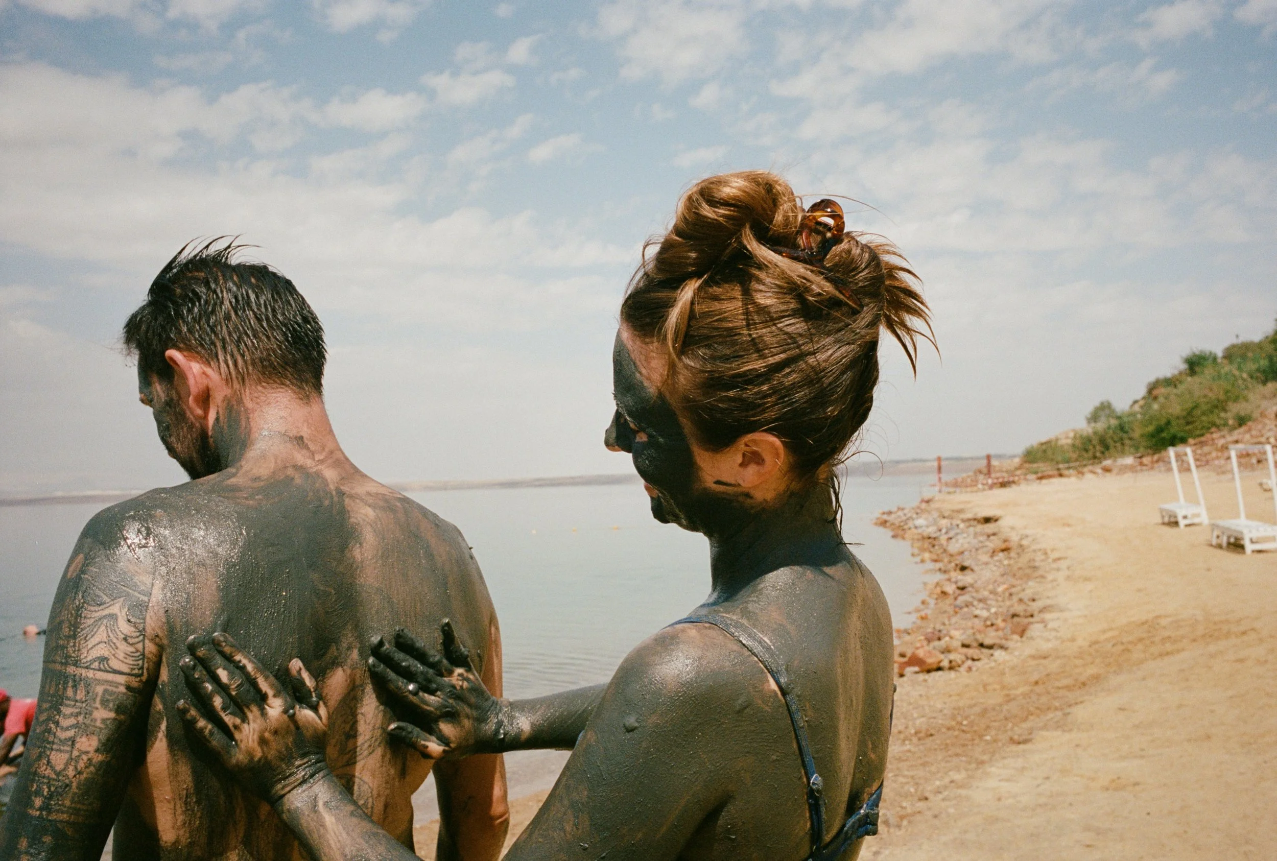 replenish your skin with a mud bath at the dead sea