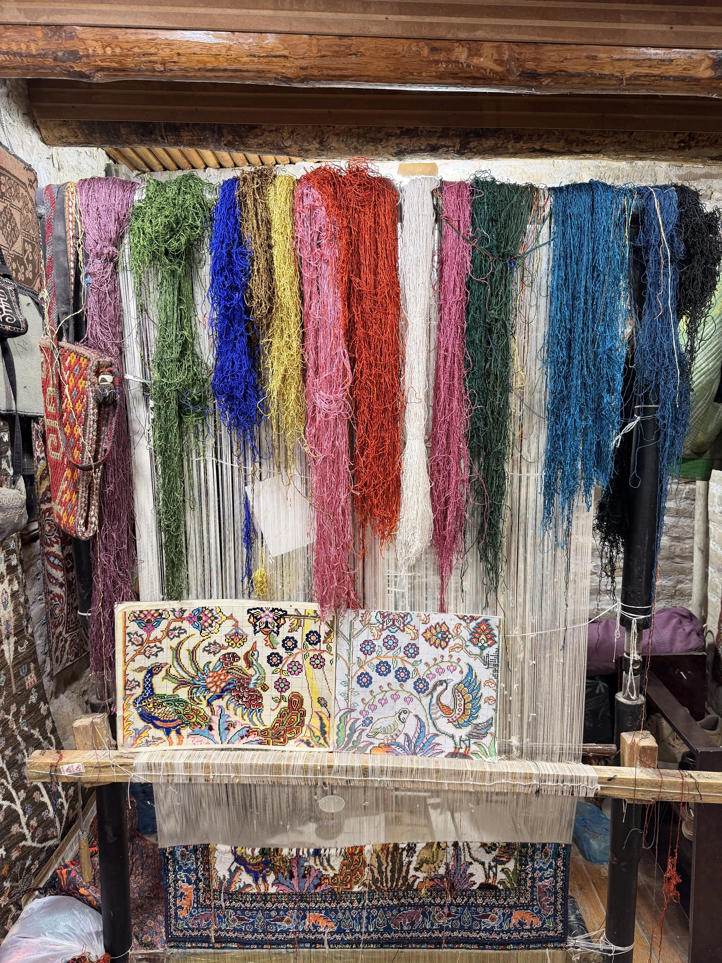 silk workshop uzbekistan bukhara showing dyed silks
