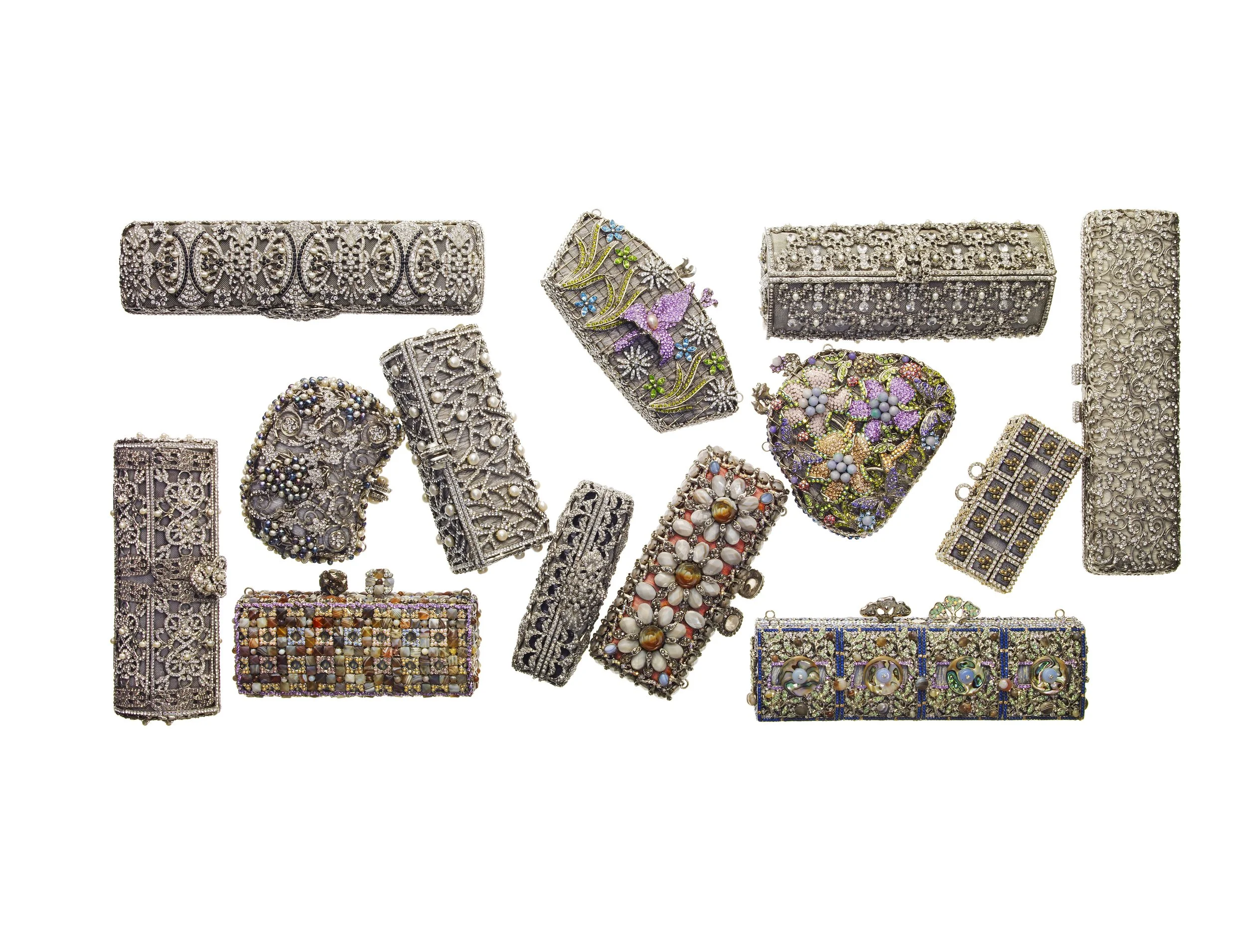 Various ornate and jeweled decorative boxes and accessories displayed on a white background.