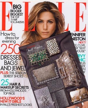 Teen woman with long brown hair on ELLE magazine cover, holding a black folder with various jewelry and accessory items inside.