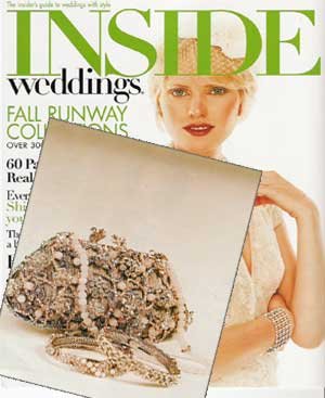 Cover of Inside Weddings magazine featuring a woman with short blonde hair holding a large photo of a textured wedding cake decorated with flowers and pearls.