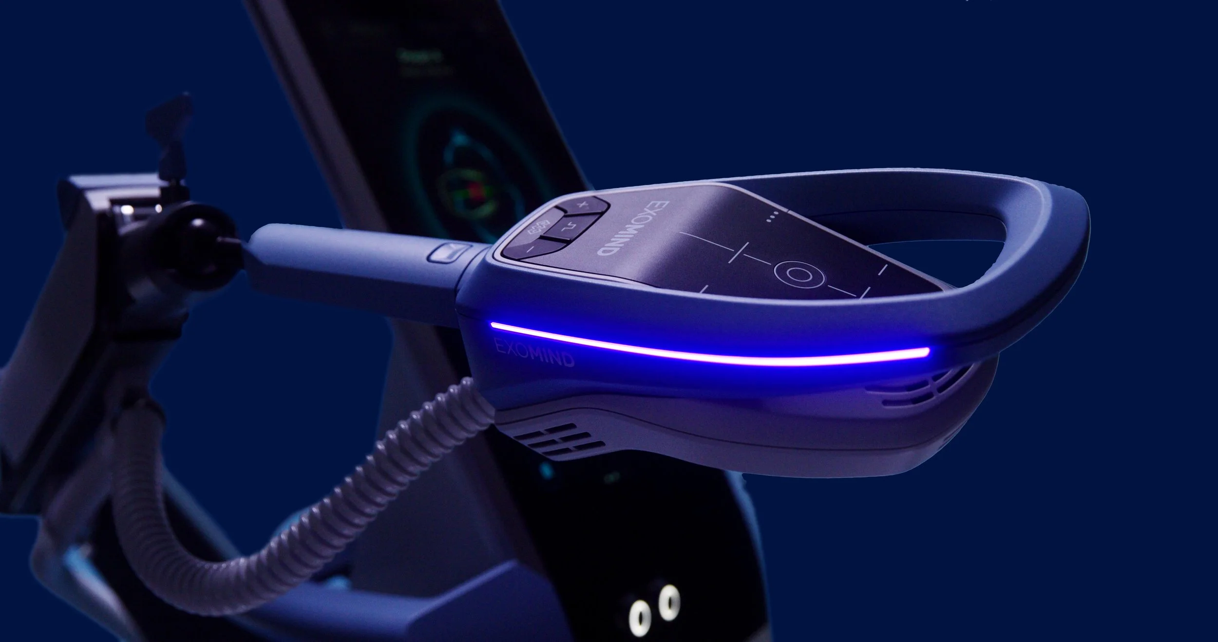 A modern electronic golf distance measuring device with a sleek design, illuminated blue light strip, and control buttons labeled 'EXOMIND' and 'CLEAR,' mounted on a tripod, with a smartphone nearby showing a circular graphic.