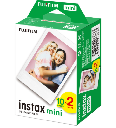Fujifilm Instax Mini instant film package with a photo of two smiling girls hugging, green and white packaging, including labels indicating 10 sheets per pack, 2 packs, and a yellow and red icon.