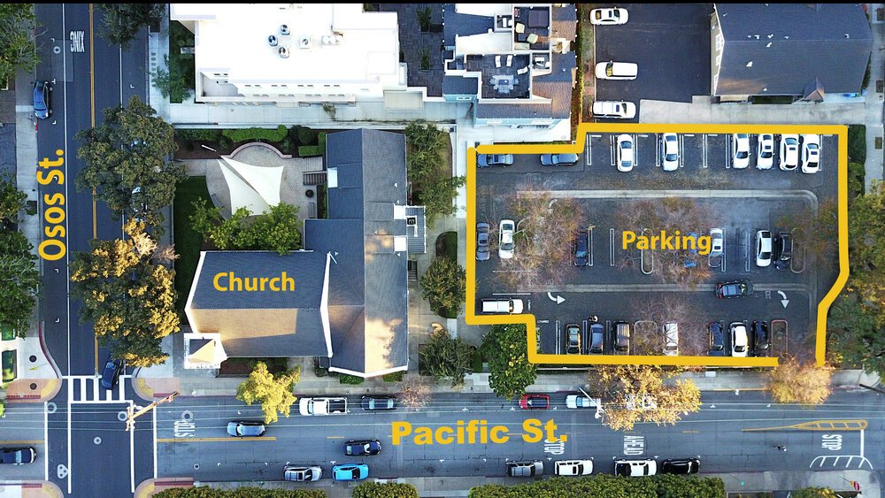 Aerial view of the church building and parking lot at the corner of Osos and Pacific streets, with parking area outlined in yellow