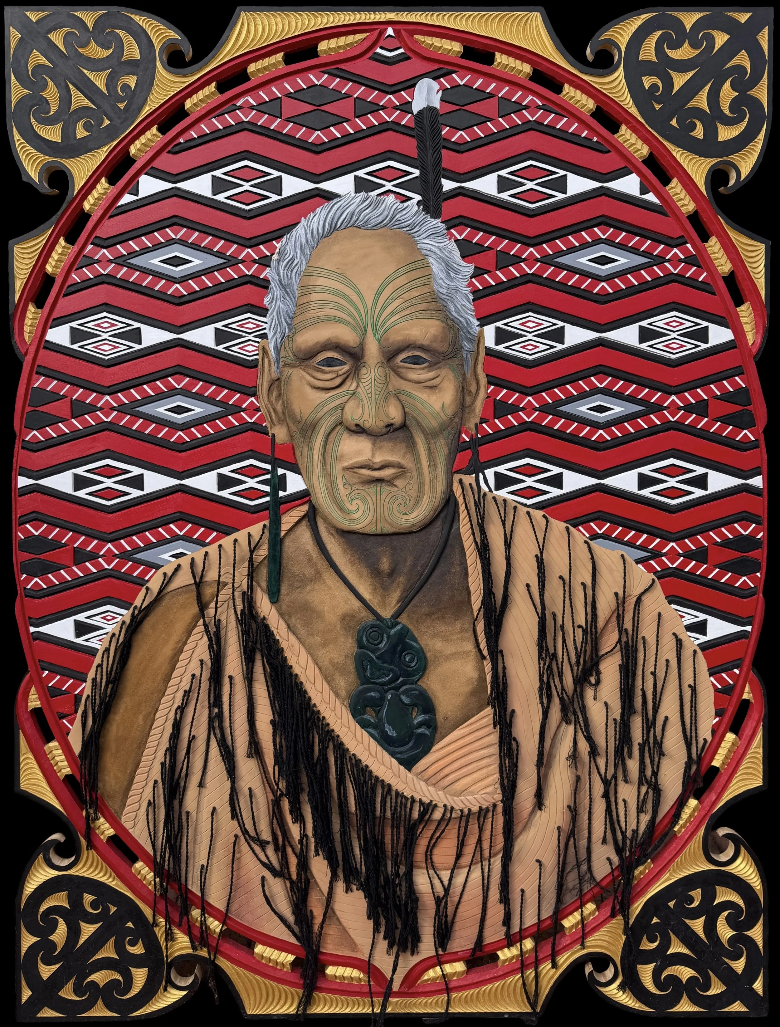 A hand carved portrait of Kamariera Te Hau Takiri Wharepapa with detailed facial Tā moko, wearing a Tiki necklace and Korowai with embroidered patterns, set against a vibrant, geometric-patterned background containing red, black, white, and gold.