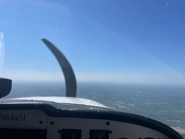 Can you spot the airplane in this picture? 

This was a picture snapped from a recent training flight. As you can tell, the skies are clear and you can see for miles... but traffic is still difficult to spot! The traffic pictured in this photo is not