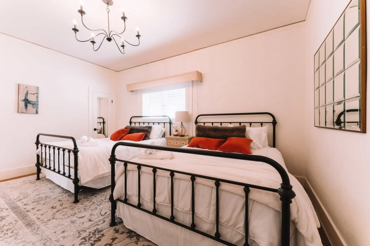 bedroom 2, consisting of two queen beds. 