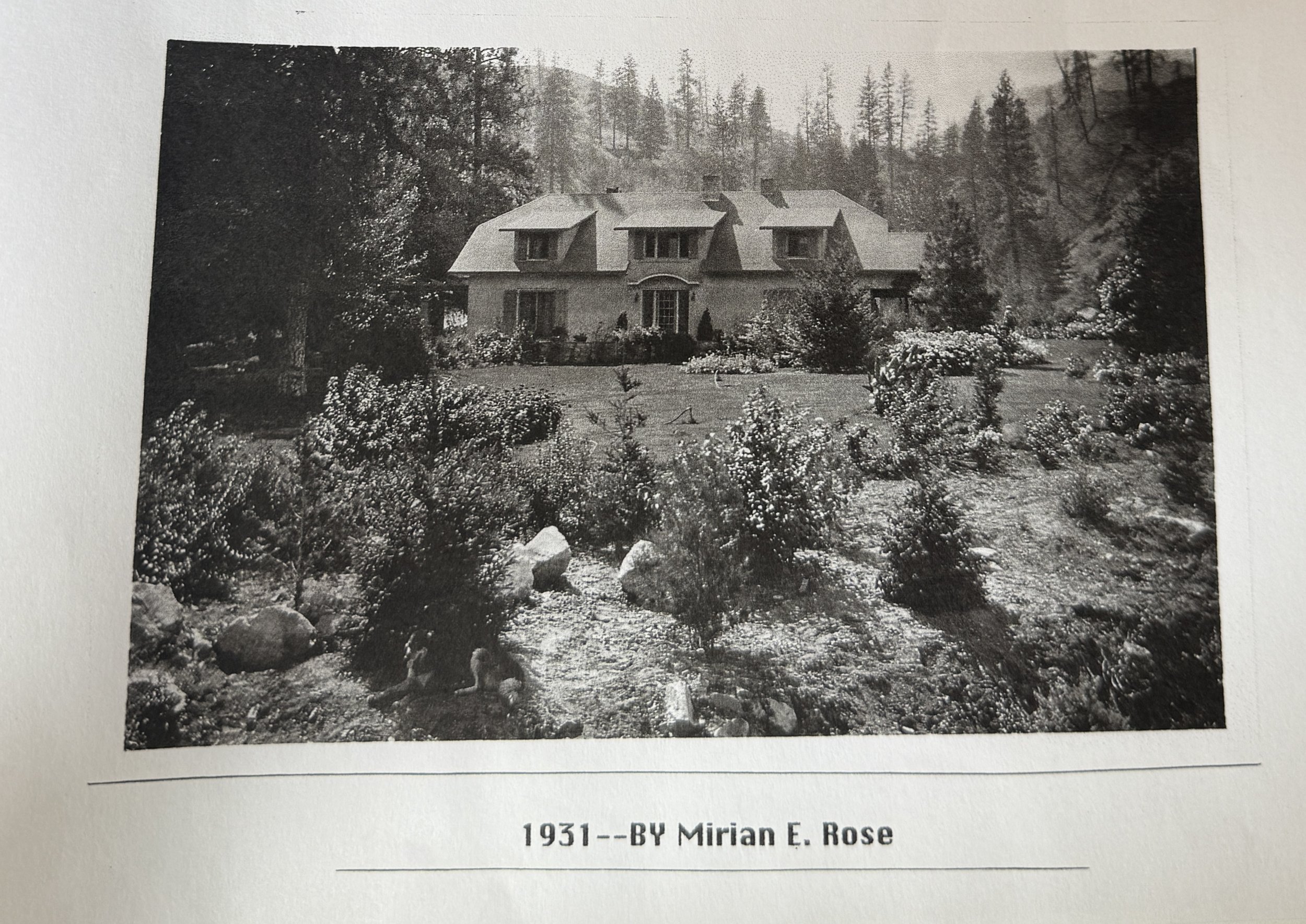 A black and white photograph taken in 1931 by Mirian E. Rose of the front of the rebuilt home in 1928.