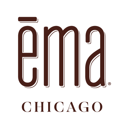 The logo for ĒMA Chicago, featuring the word 'ēma' in large, lowercase brown letters with 'Chicago' written underneath.