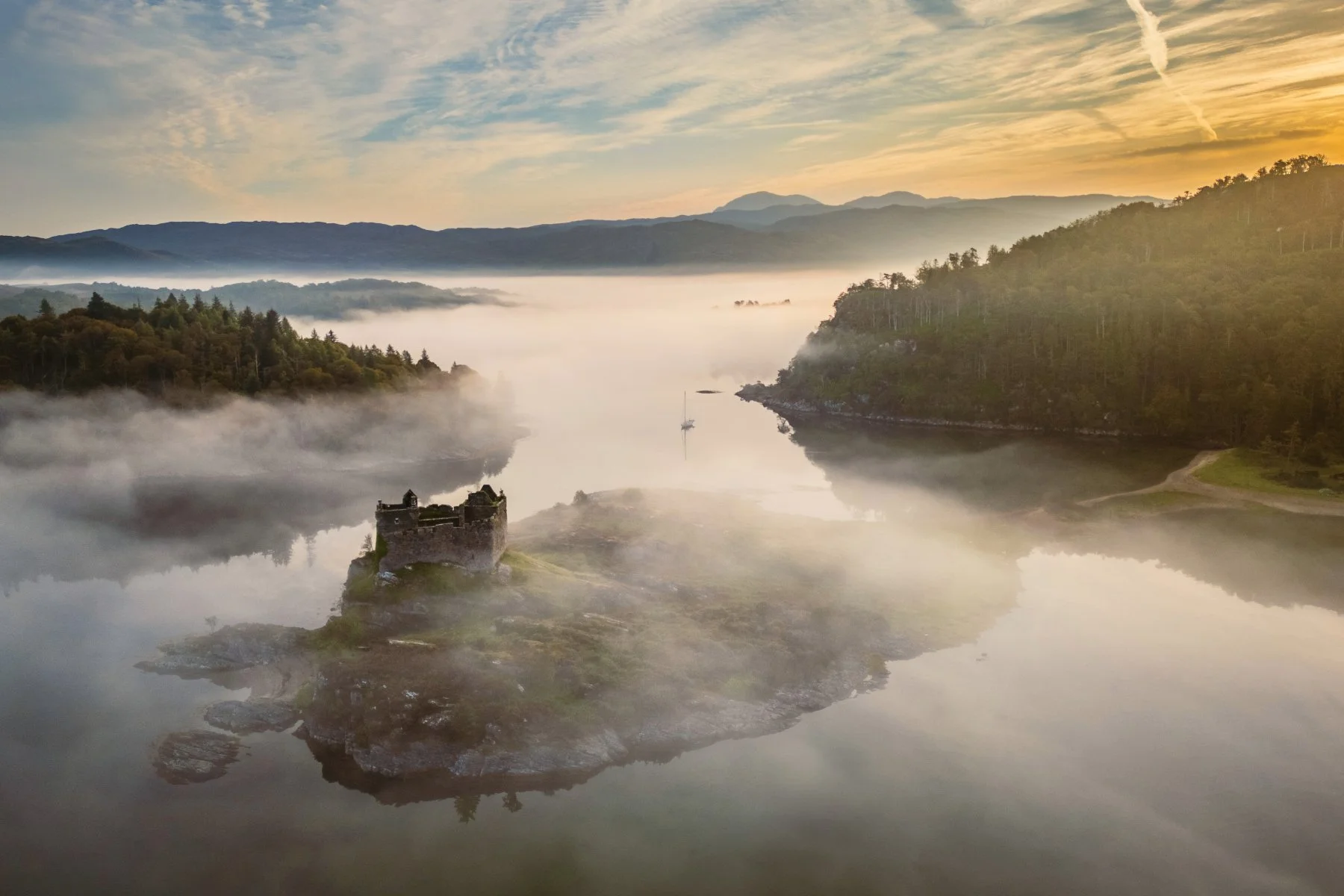 An aerial view of a misty morning Loch Moidart, Dorlin and Castle Tioram at sunrise | Moidart Scotland | Steven Marshall Photography
