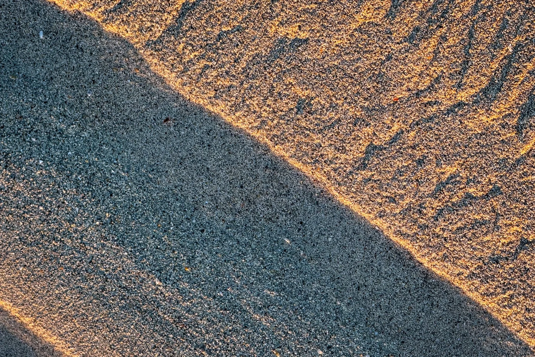 Close up abstract shot of shade and light on the sand of the beach at Sanna | Ardnamurchan Scotland | Steven Marshall Photography