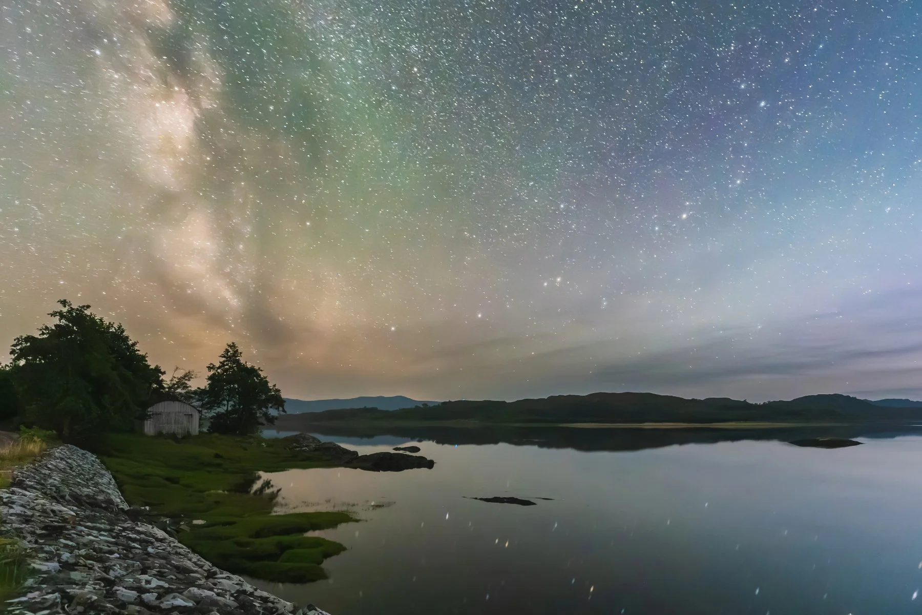 The stars and milky way above a boathouse beside the River Shiel at Dorlin | Moidart Scotland | Steven Marshall Photography