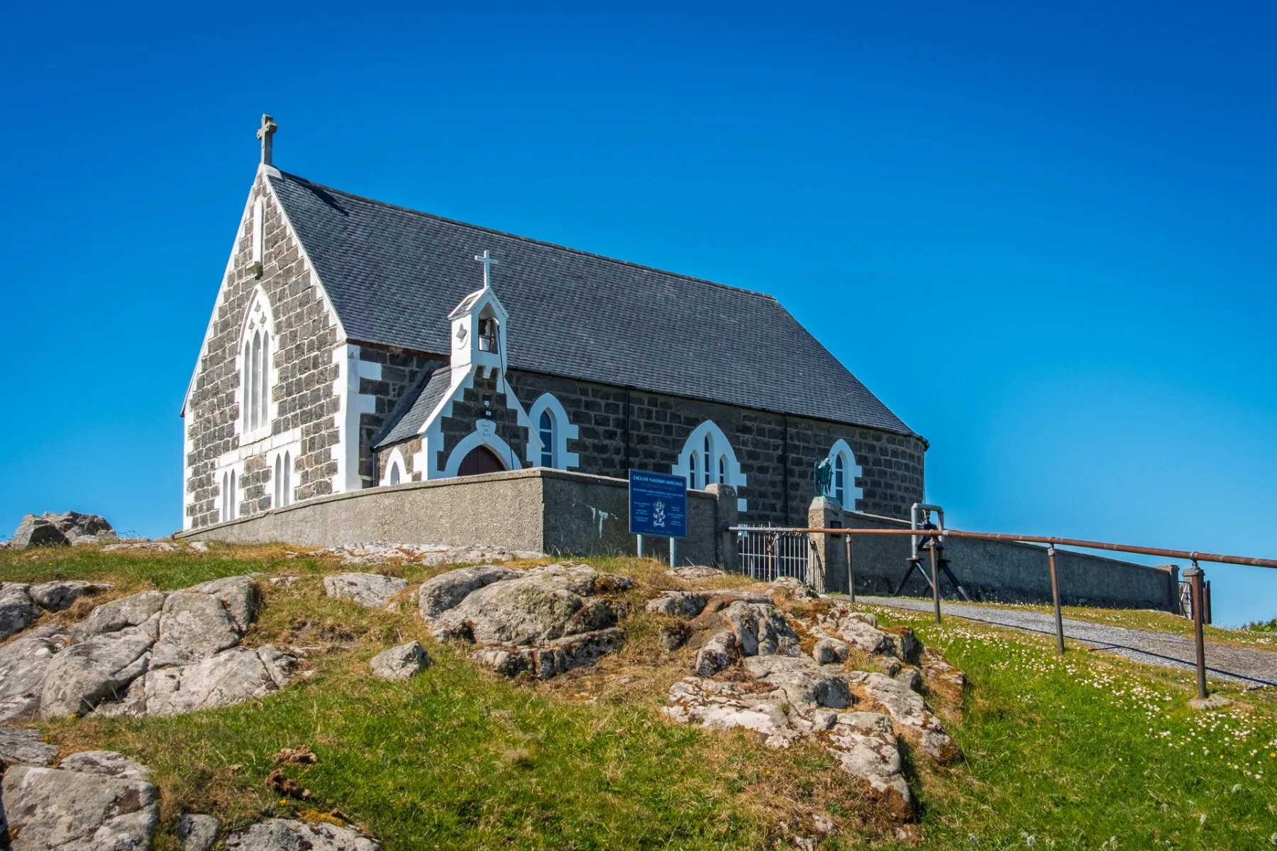 Saint Michael’s Church on the Isle of Eriskay under a bright blue sky | Outer Hebrides Scotland | Steven Marshall Photography