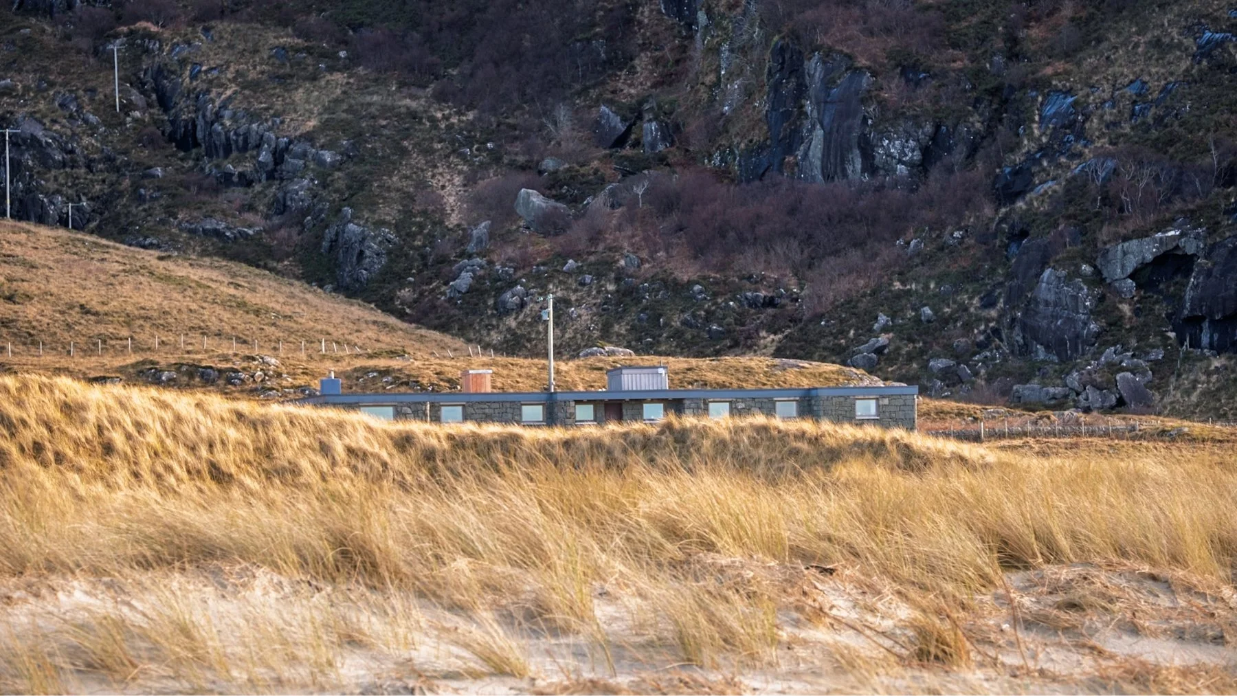 Sanna Bheag, the flat roofed house that was once home to the writer and photographer, M. E. M. Donaldson, viewed across the marram grass covered dunes that surround the beach at Sanna | Ardnamurchan Scotland | Steven Marshall Photography