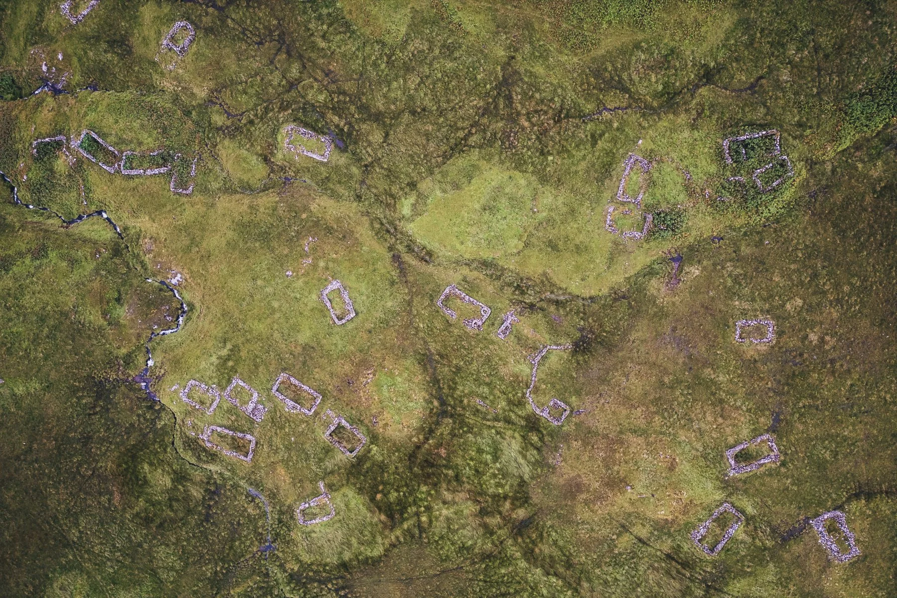 Aerial drone shot of croft house ruins in the Scottish Highlands | Bourblaige Cleared Settlement, Ardnamurchan, Scotland | Steven Marshall Photography