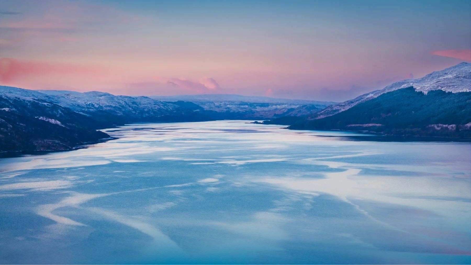 The pink tinge of the Belt of Venus above the snow-covered hills of Morvern and Ardnamurchan mixing with the blue hour blues at sundown. Loch Sunart, Resipole. | Sunart Scotland | Steven Marshall Photography