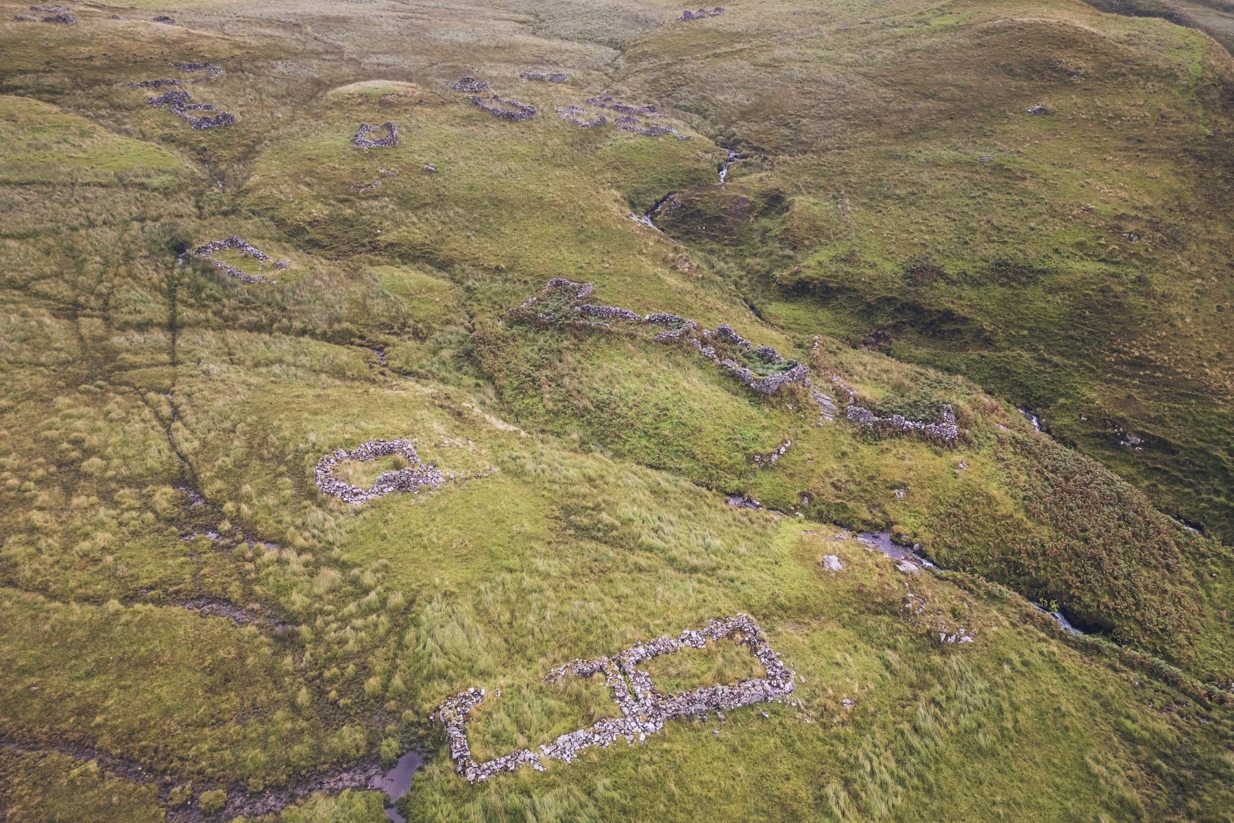Aerial drone shot of croft house ruins in the Scottish Highlands | Bourblaige Cleared Settlement, Ardnamurchan, Scotland | Steven Marshall Photography