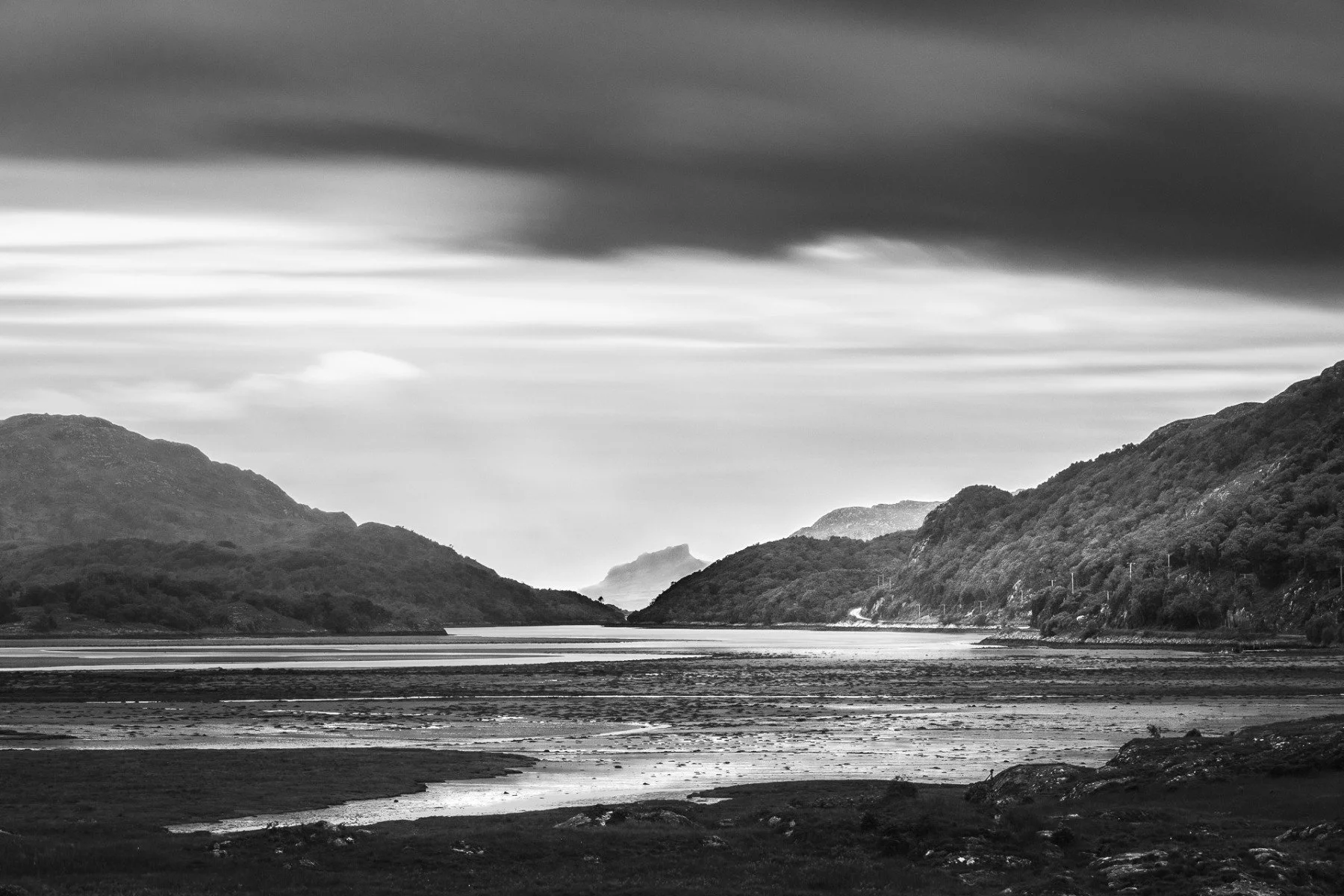 Long exposure black and white image of An Sgurr on the Isle of Eigg viewed through the north channel of Loch Moidart from Ardmolich | Kinlochmoidart Moidart Scotland | Steven Marshall Photography