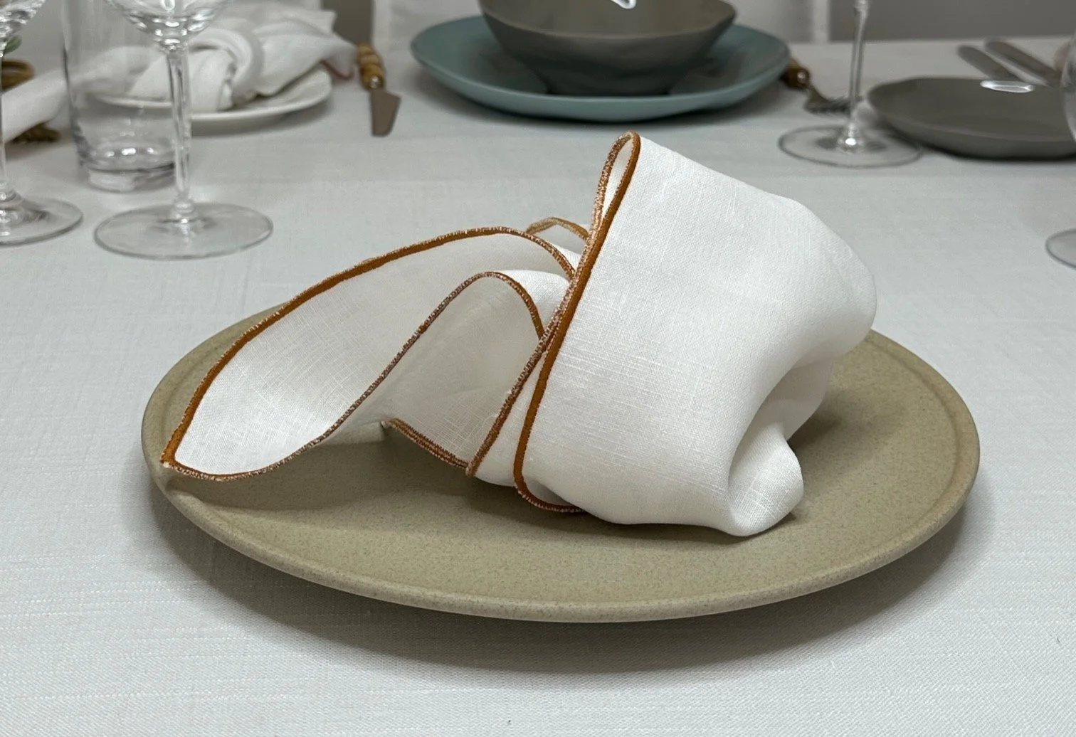 white-linen-with-rust-edge-napkin-01.jpg
