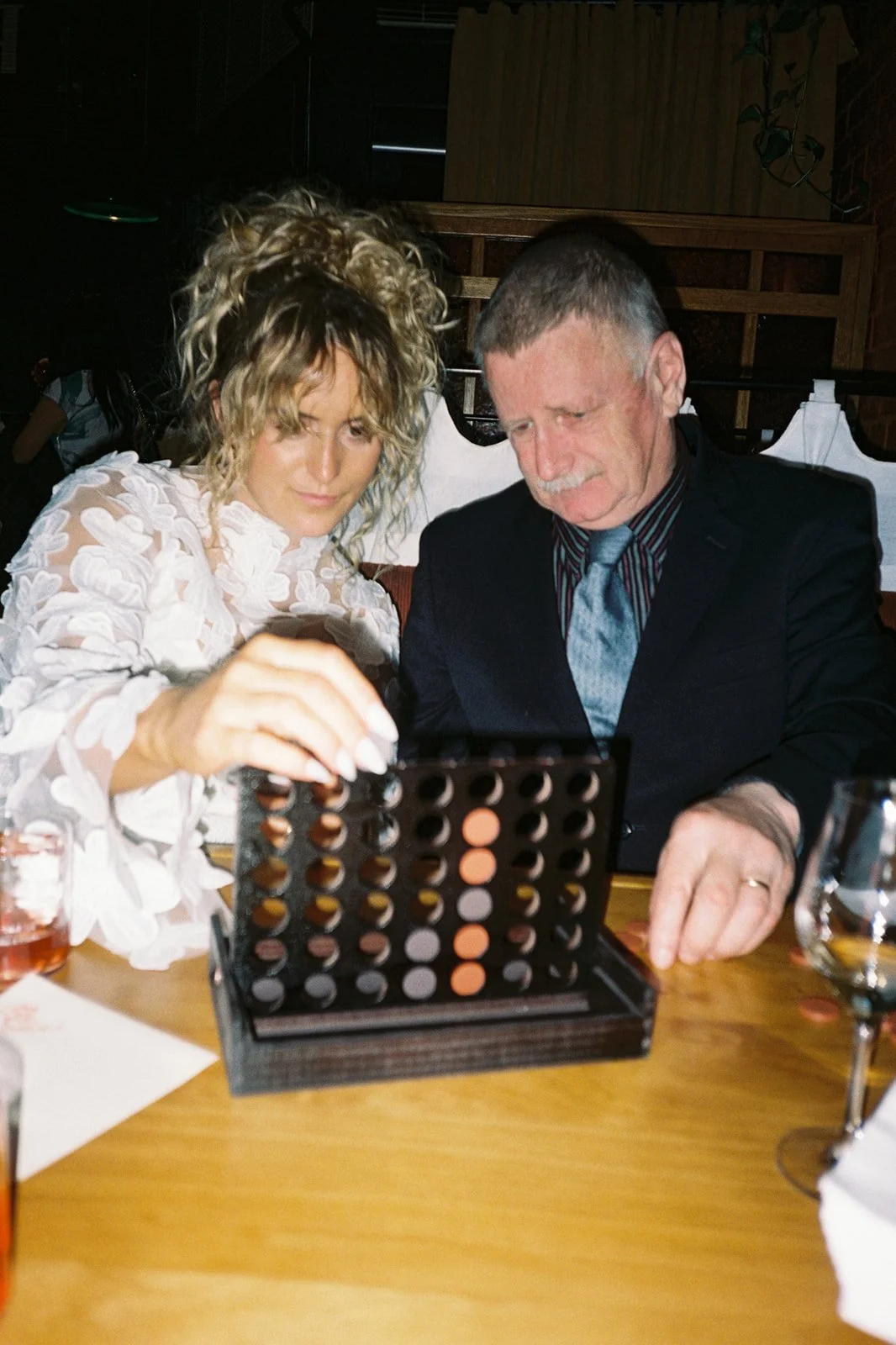 The Analog Divide: Disposable Cameras VS Professional Film at Your Wedding