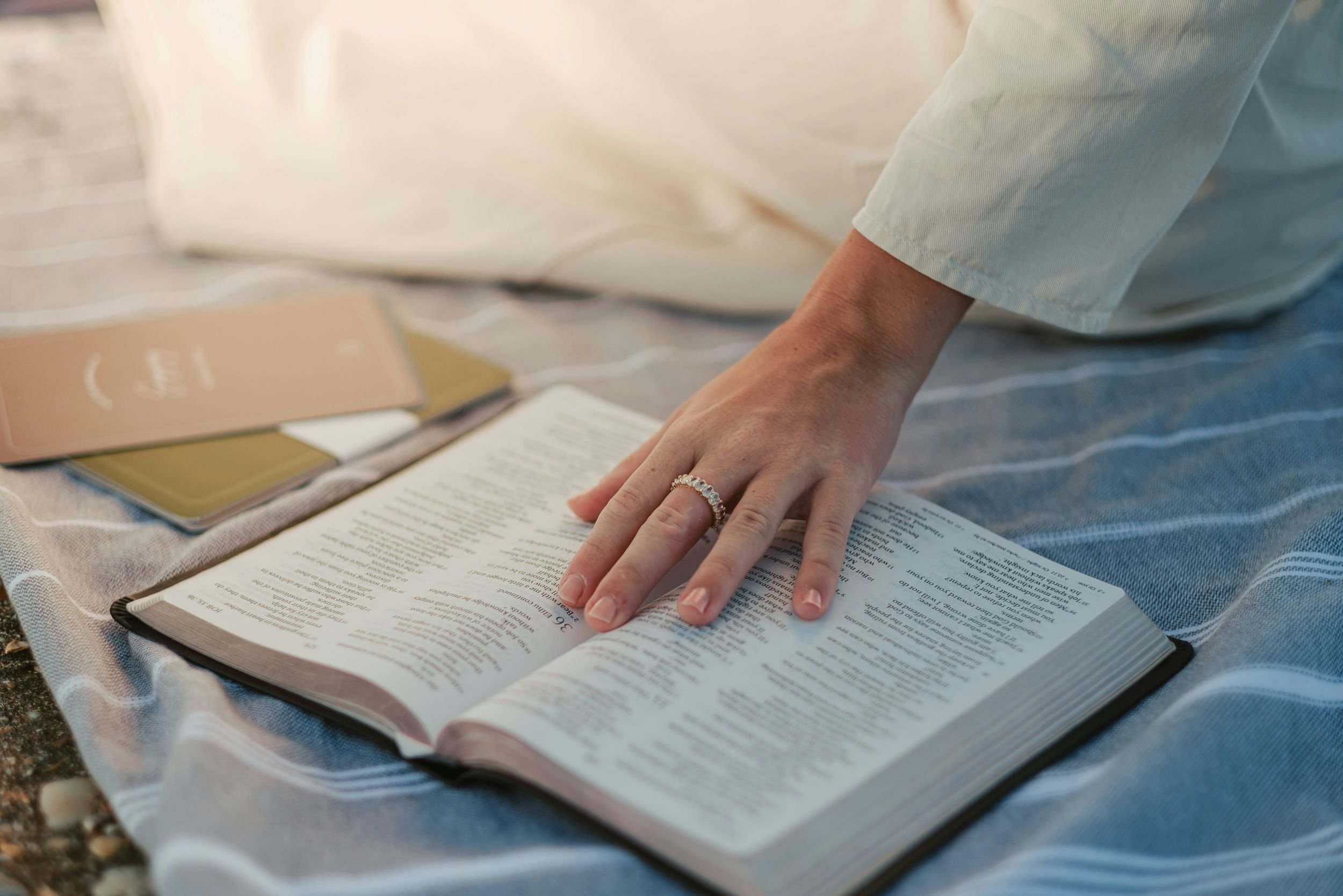 A woman reading scripture to discover what God says about women in leadership.