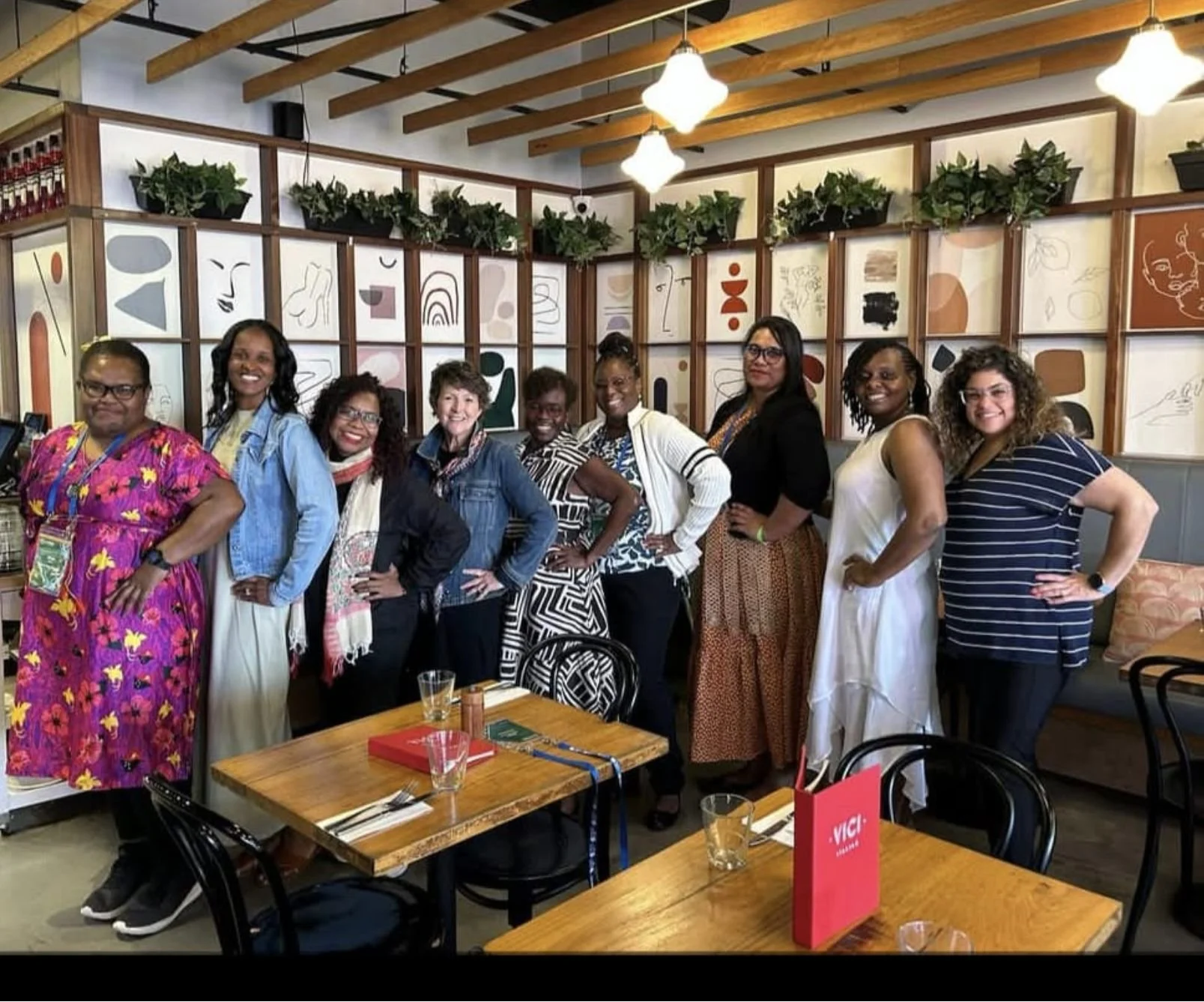Women at an Uptick Global Leaders event learning new leadership skills.