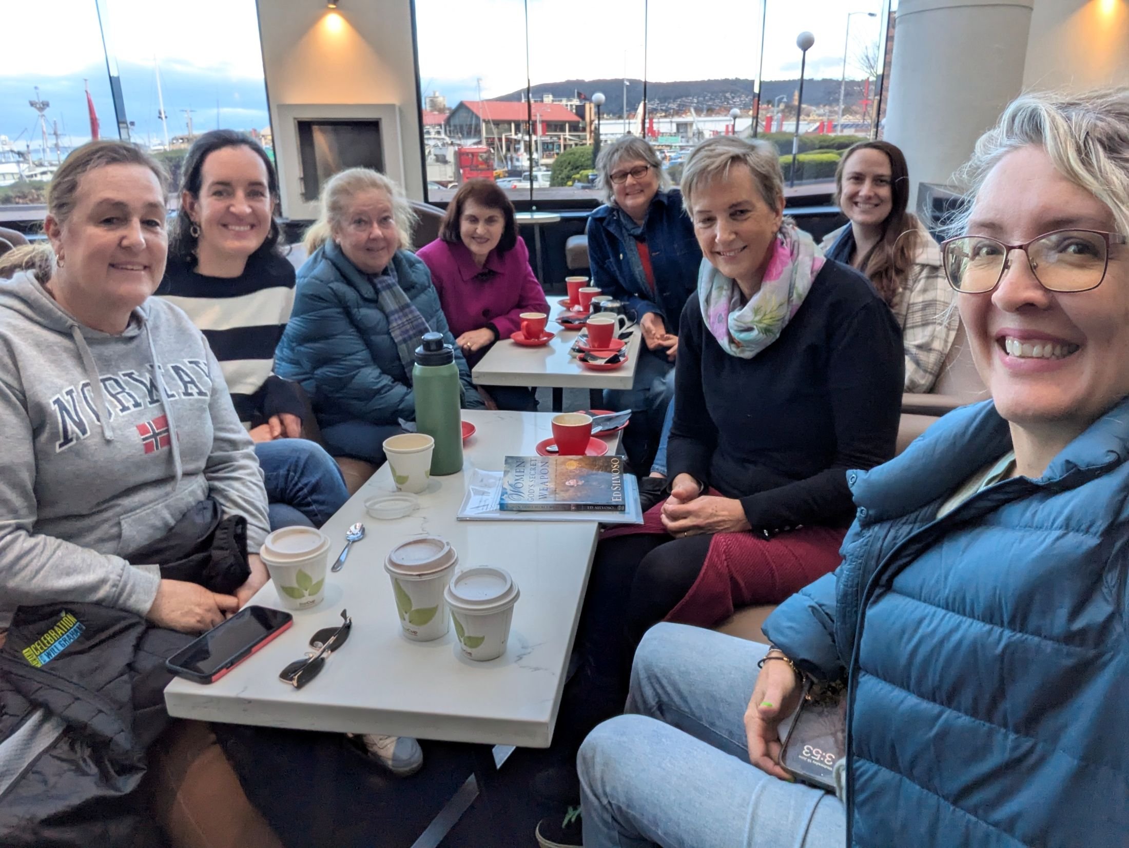 Women gathered at a cafe to talk about leadership and faith.