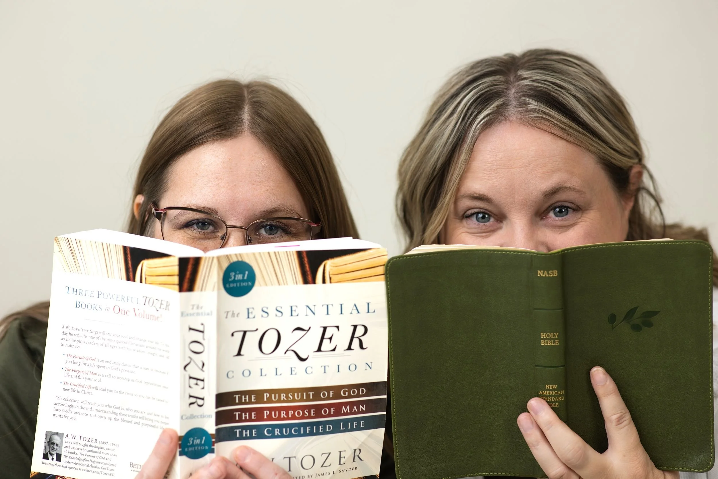 The Gritty Girls holding books on faith and leadership.