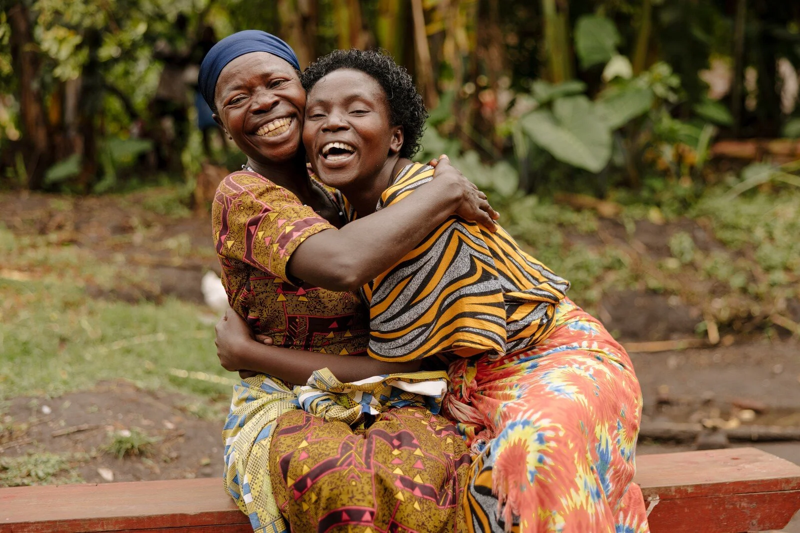 Women leaders in Africa, laughing and smiling.