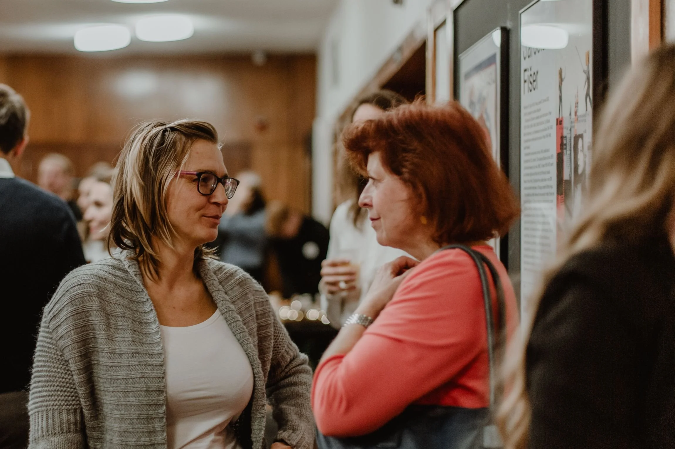 Two women sharing stories about women leading in today's world.