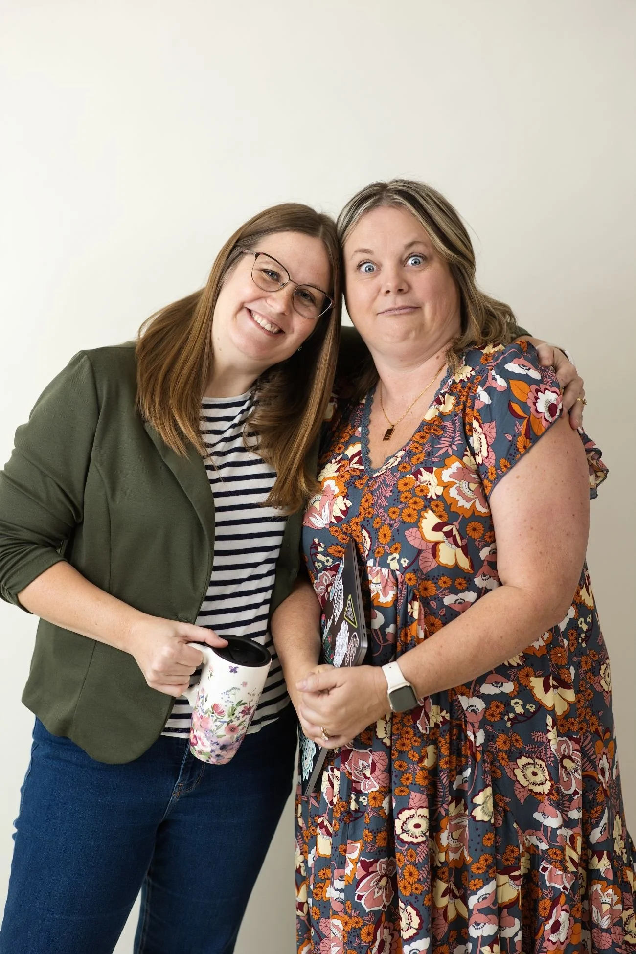 Jeannie and Chel from the Gritty Girl Podcast smiling and looking at the camera.