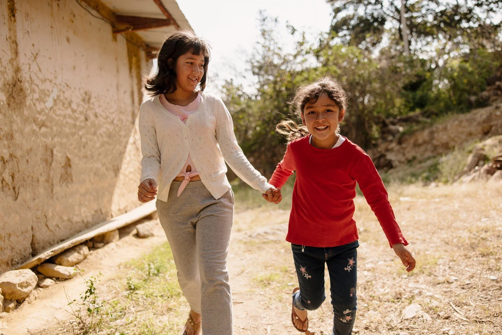 Young women running.