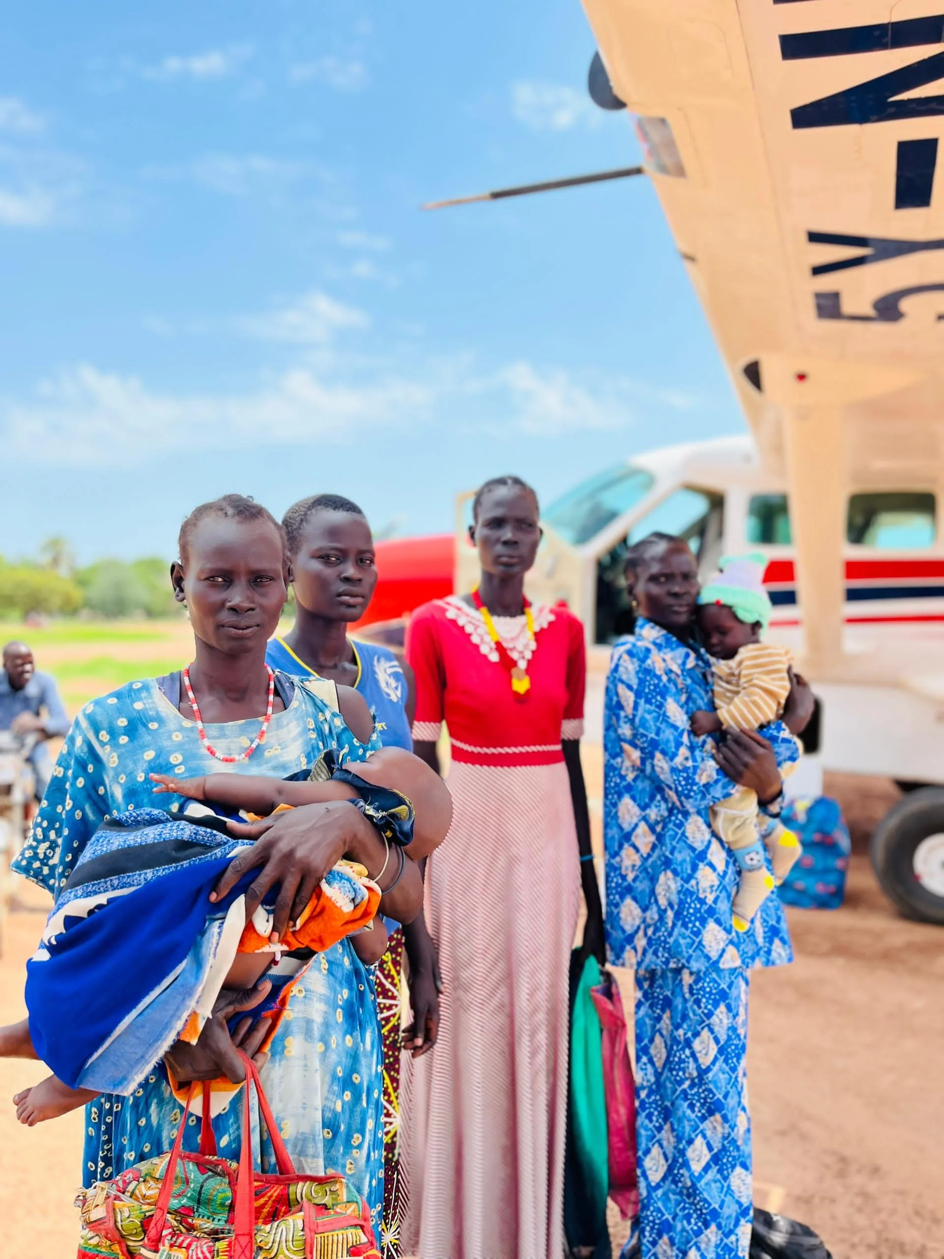 Women in Africa recieving support from Mission Aviation Fellowship.