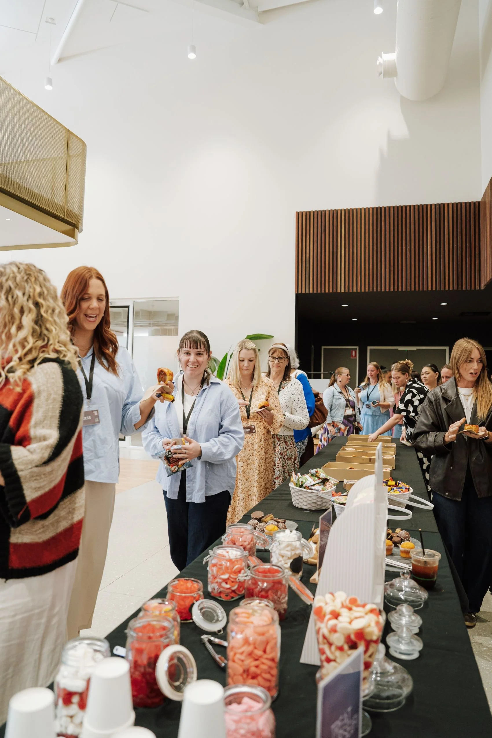 Women leaders enjoying lunch at an Esther's Table leadersip conference.