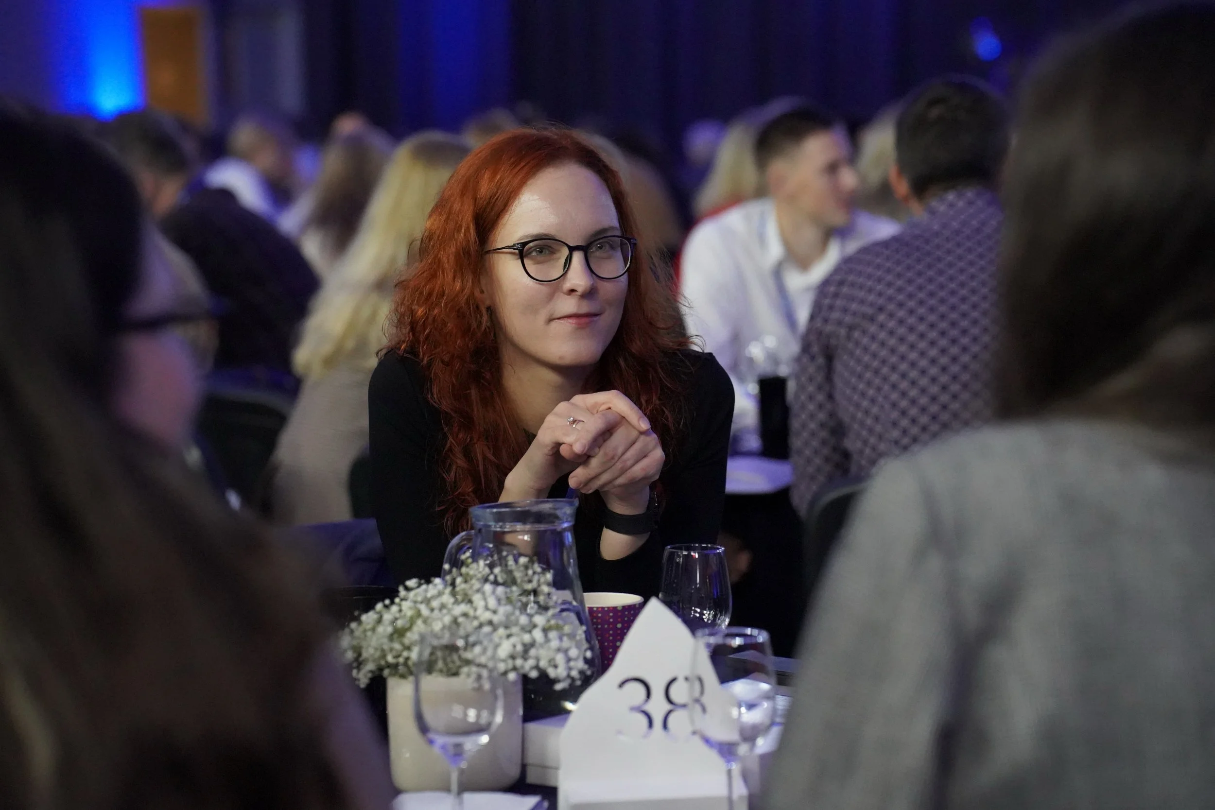 A womaen attending a women in leadership event.