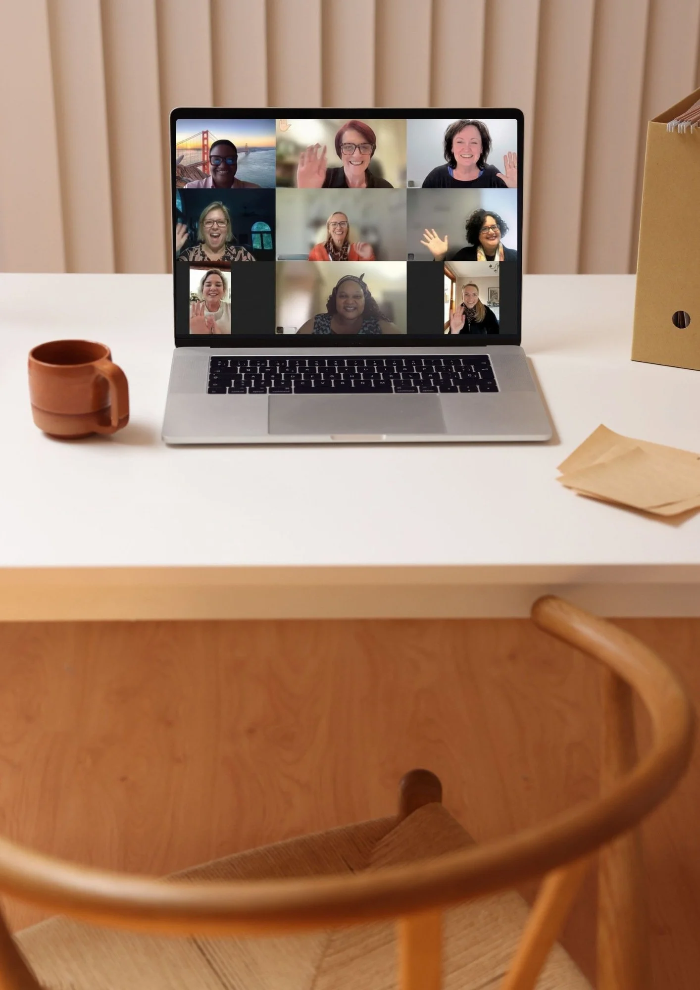 A laptop displaying an online women leaders community.
