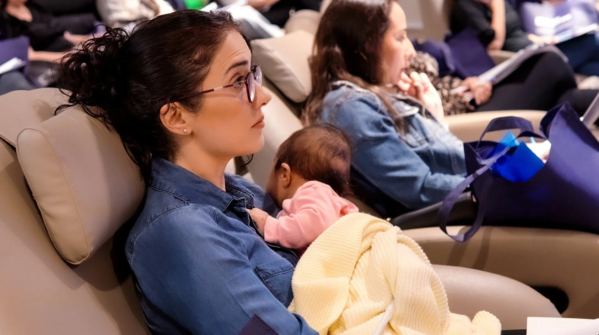 A woman leader with her baby.