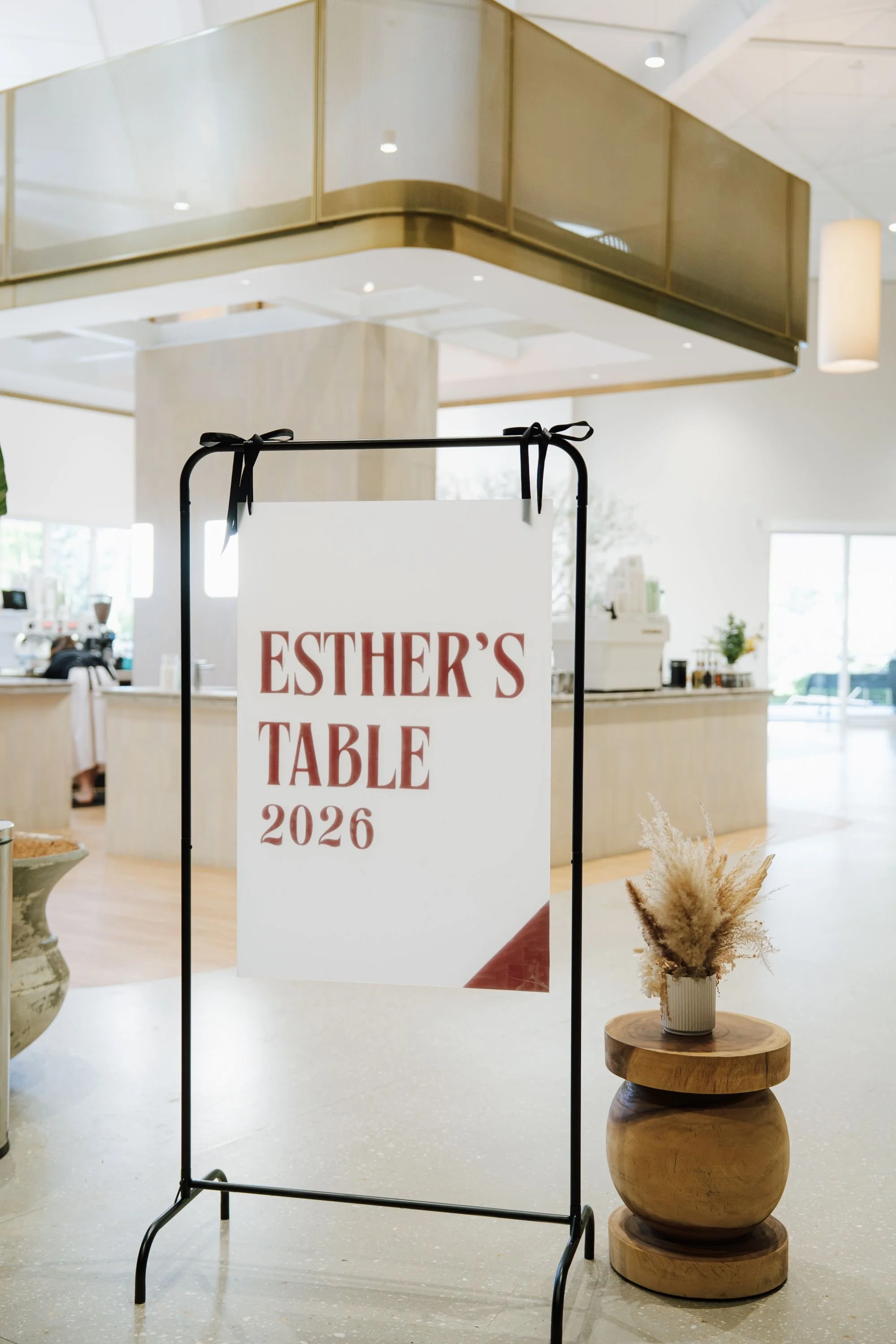 An Esther's Table leadership event.