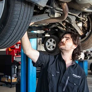 Assure-Automotive-Robina-mechanic-repairing-car